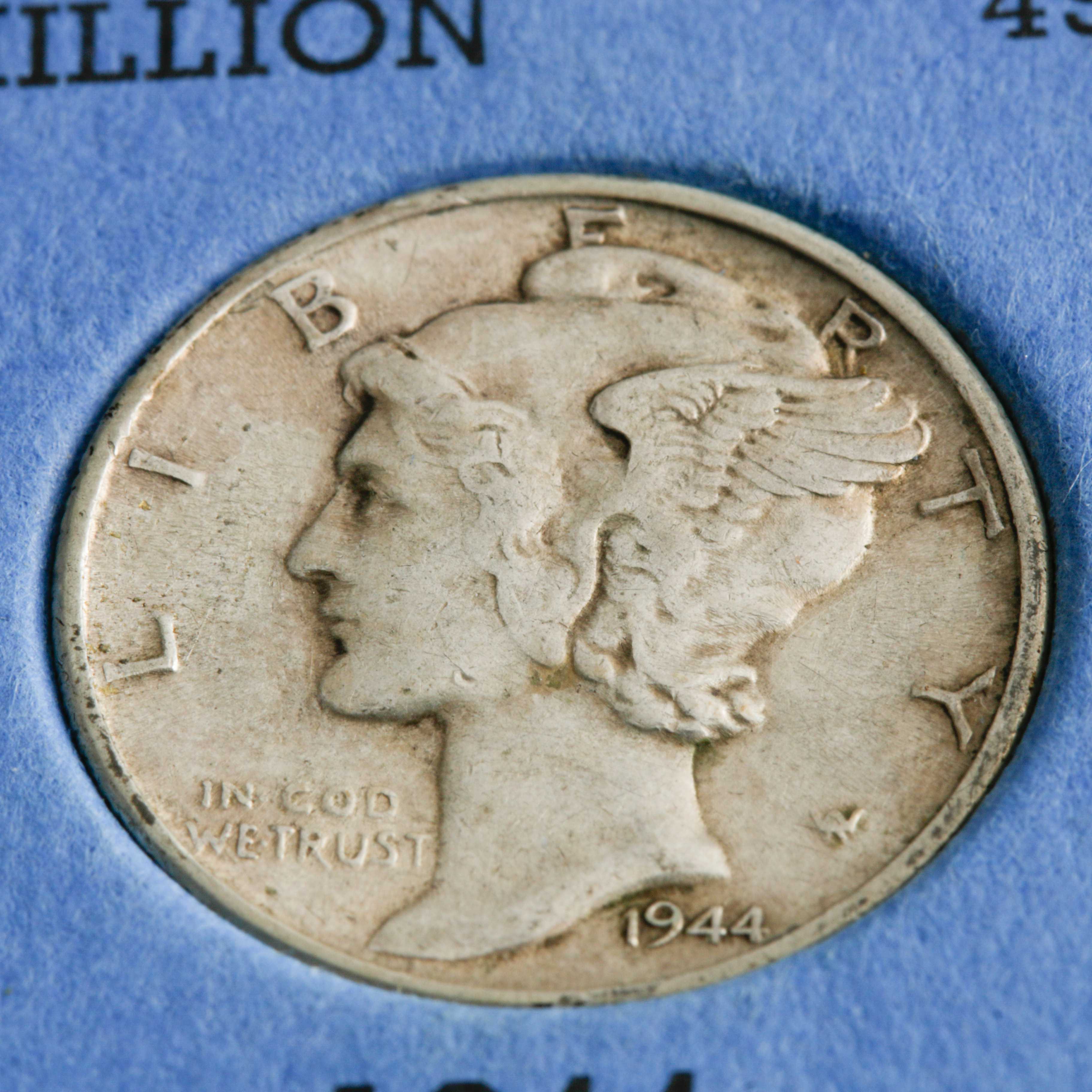 Group of 56 Silver Mercury Dimes in a Whitman Coin Folder Ranging in Age from 1916 to 1945