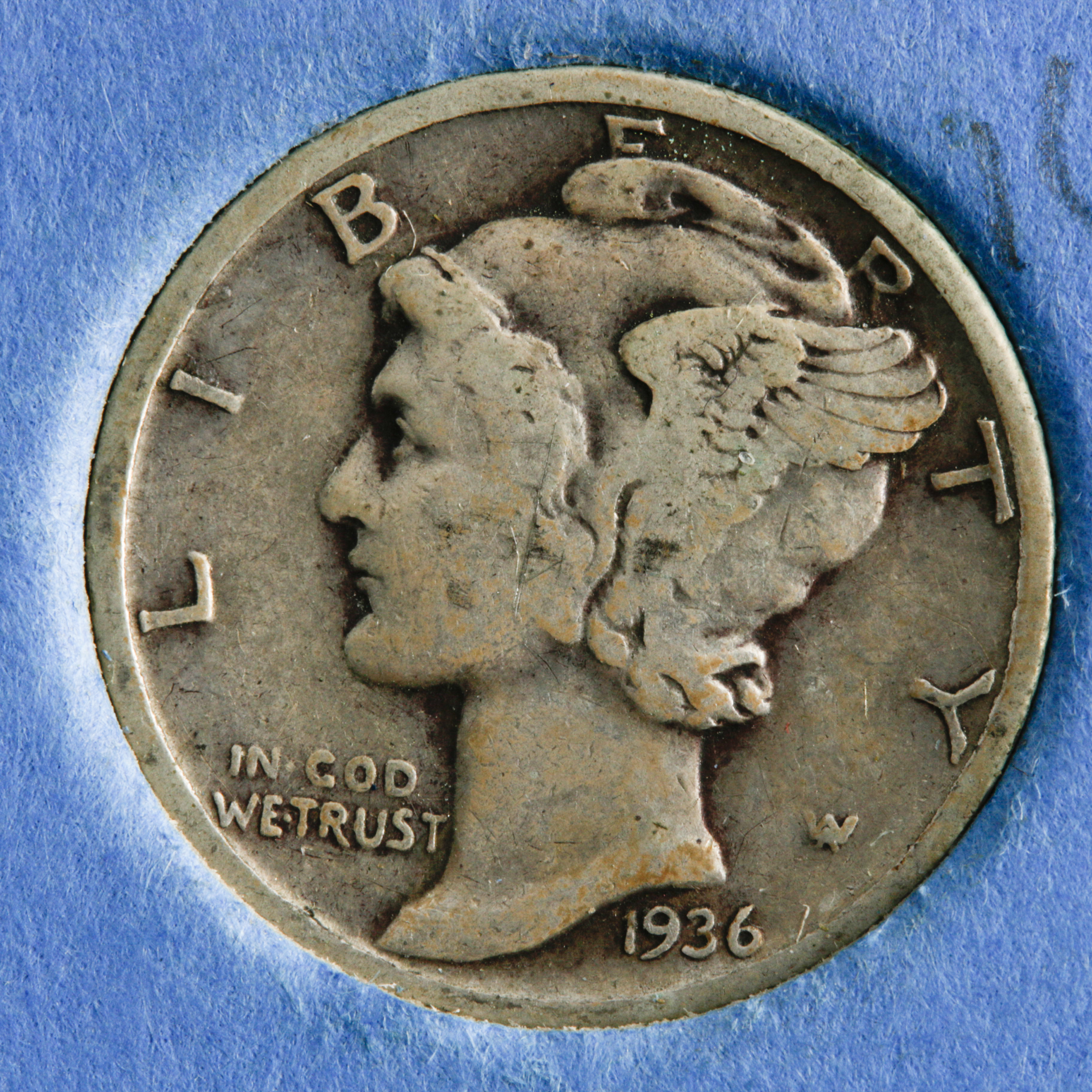 Group of 56 Silver Mercury Dimes in a Whitman Coin Folder Ranging in Age from 1916 to 1945