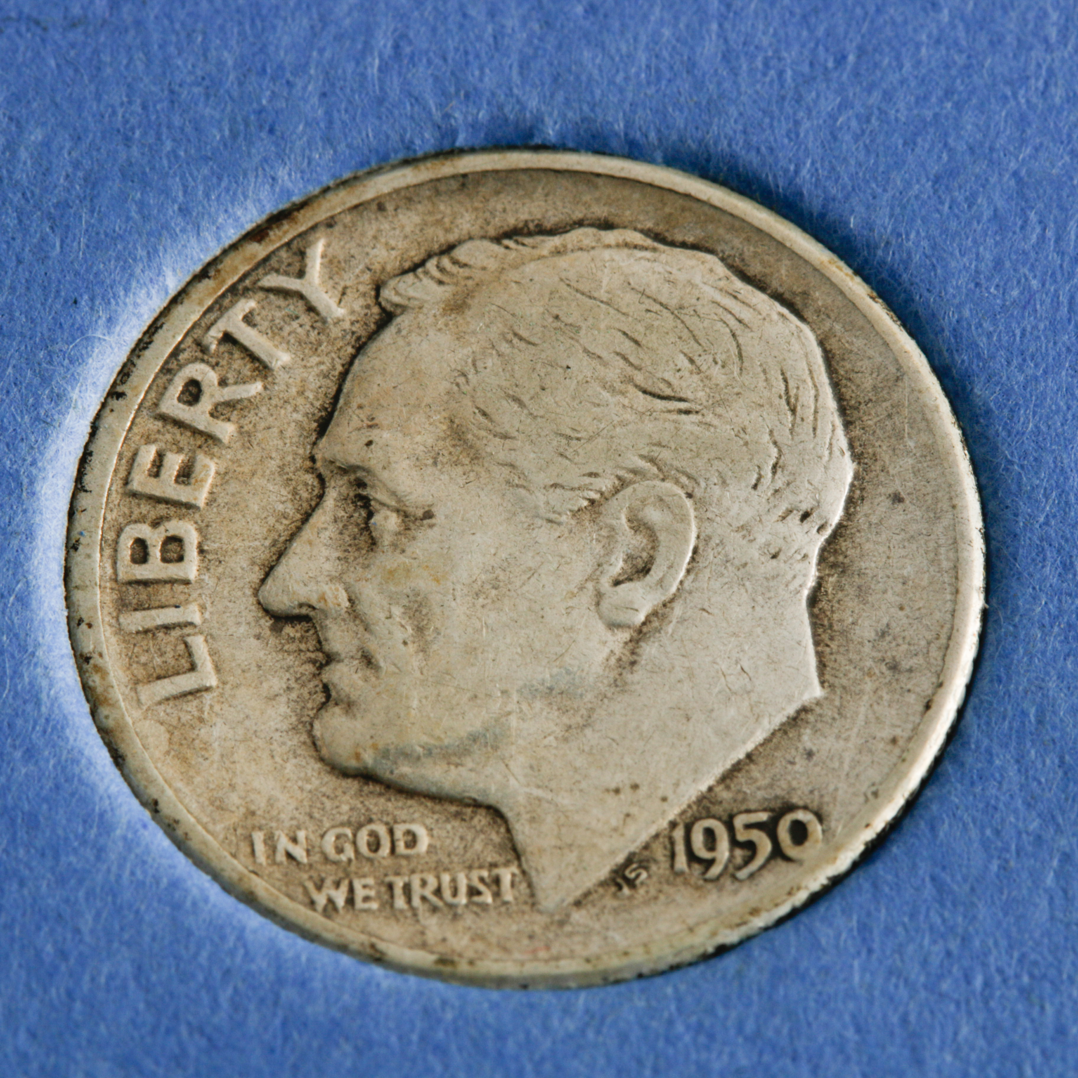 Group of 47 Silver Roosevelt Dimes in a Whitman Coin Folder Ranging in Age from 1946 to 1964