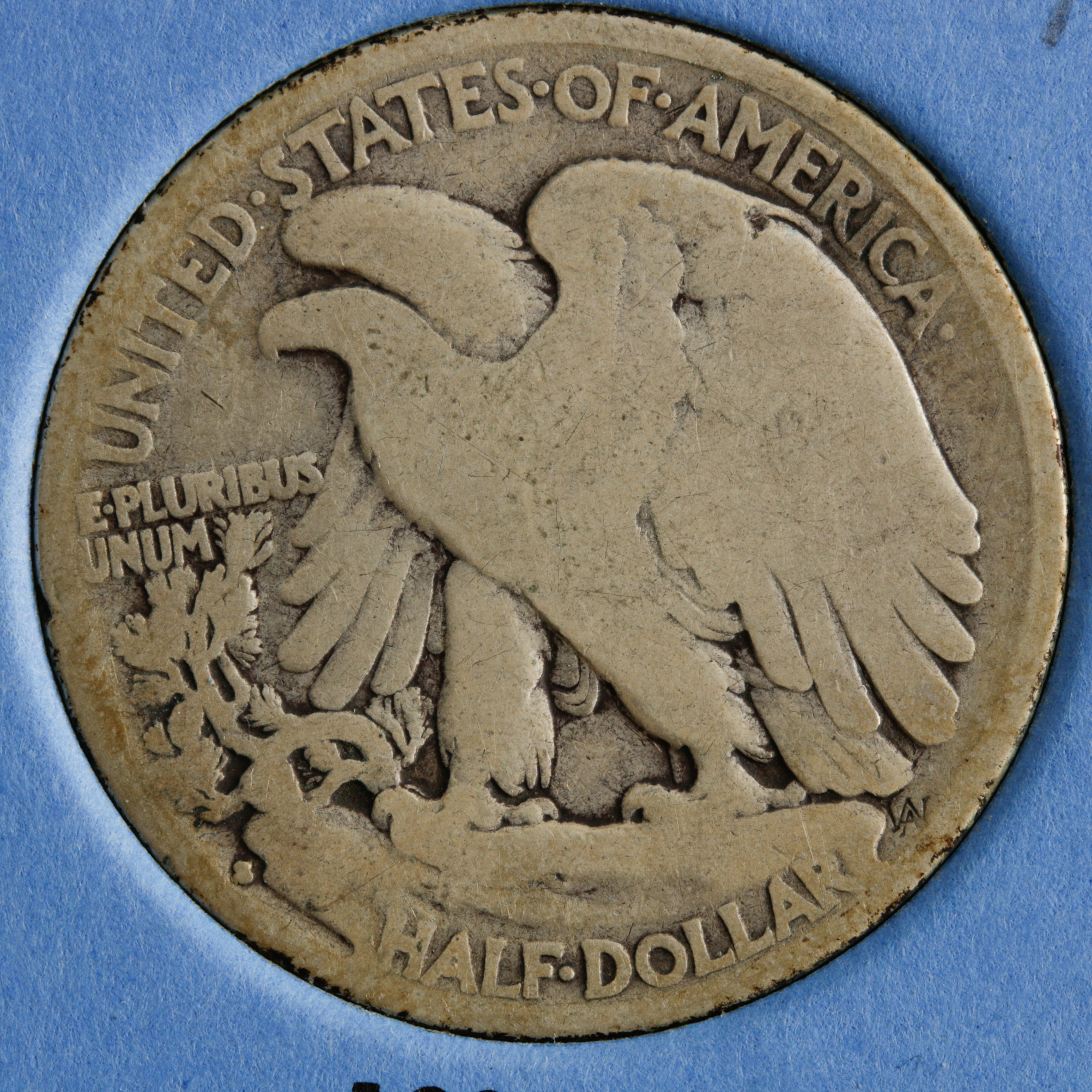 Group of 14 Walking Liberty Silver Half Dollars in a Whitman Coin Folder Ranging in Age from 1917 to 1936