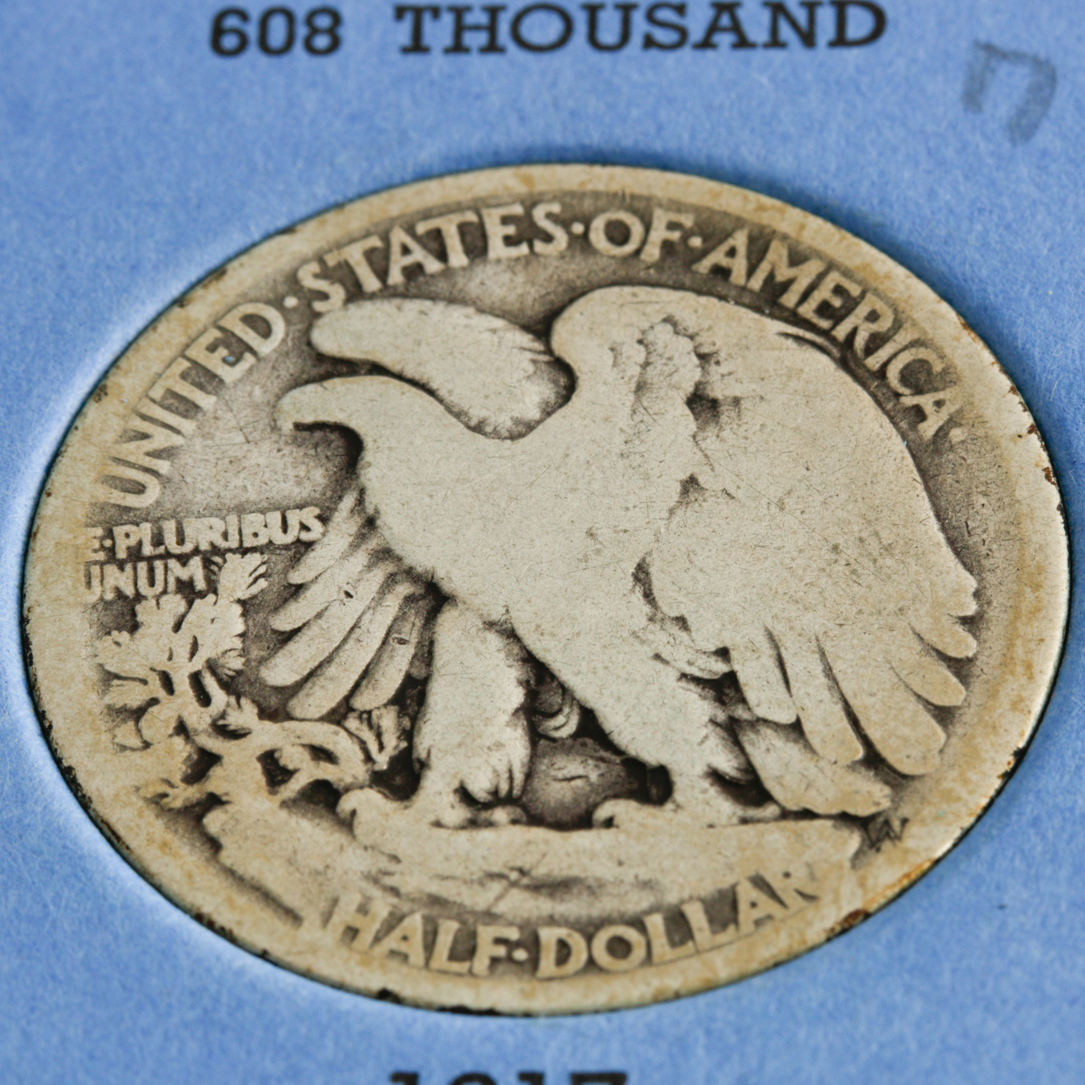 Group of 14 Walking Liberty Silver Half Dollars in a Whitman Coin Folder Ranging in Age from 1917 to 1936