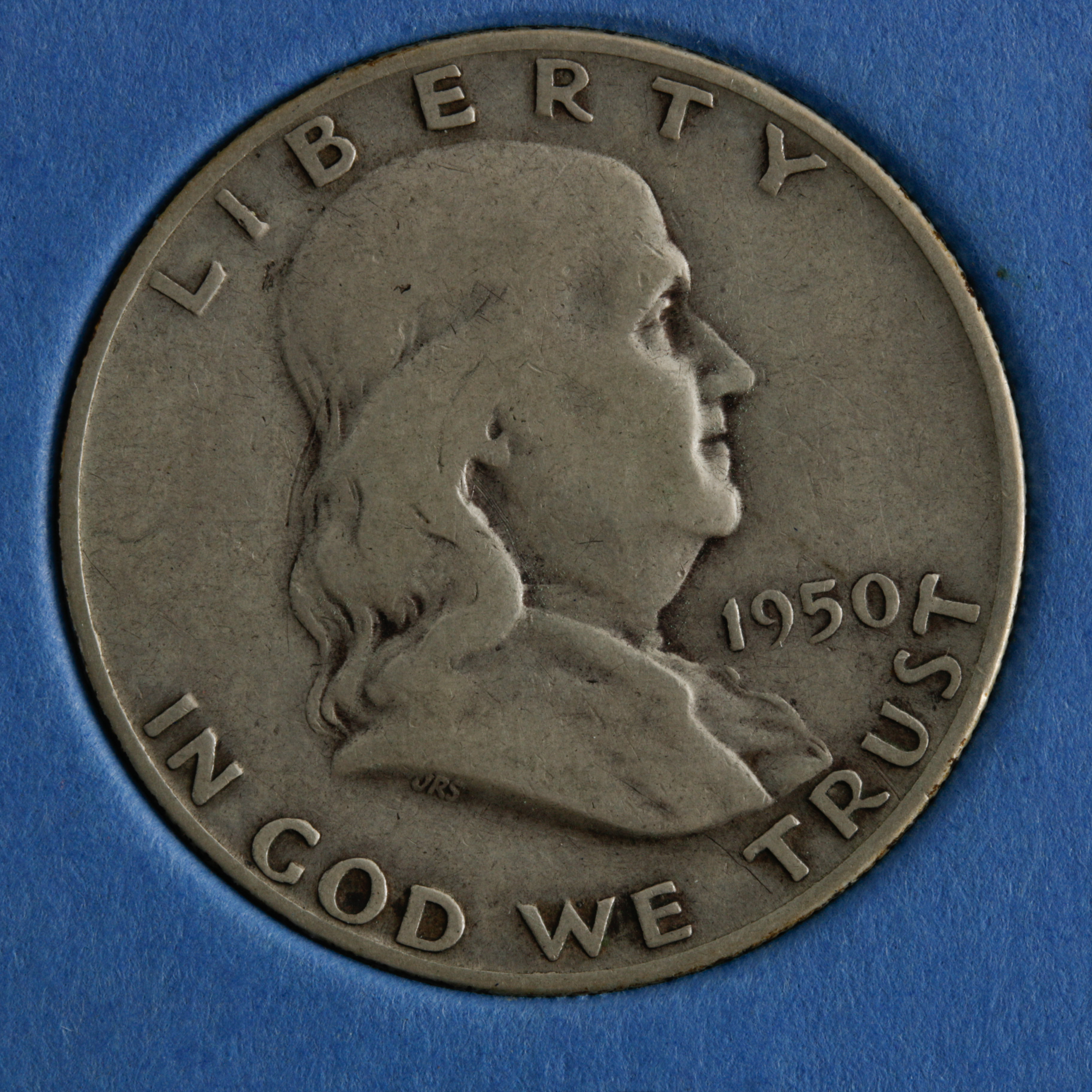 Group of 28 Benjamin Franklin Silver Half Dollars in a Whitman Coin Folder Ranging in Age from 1949 to 1963