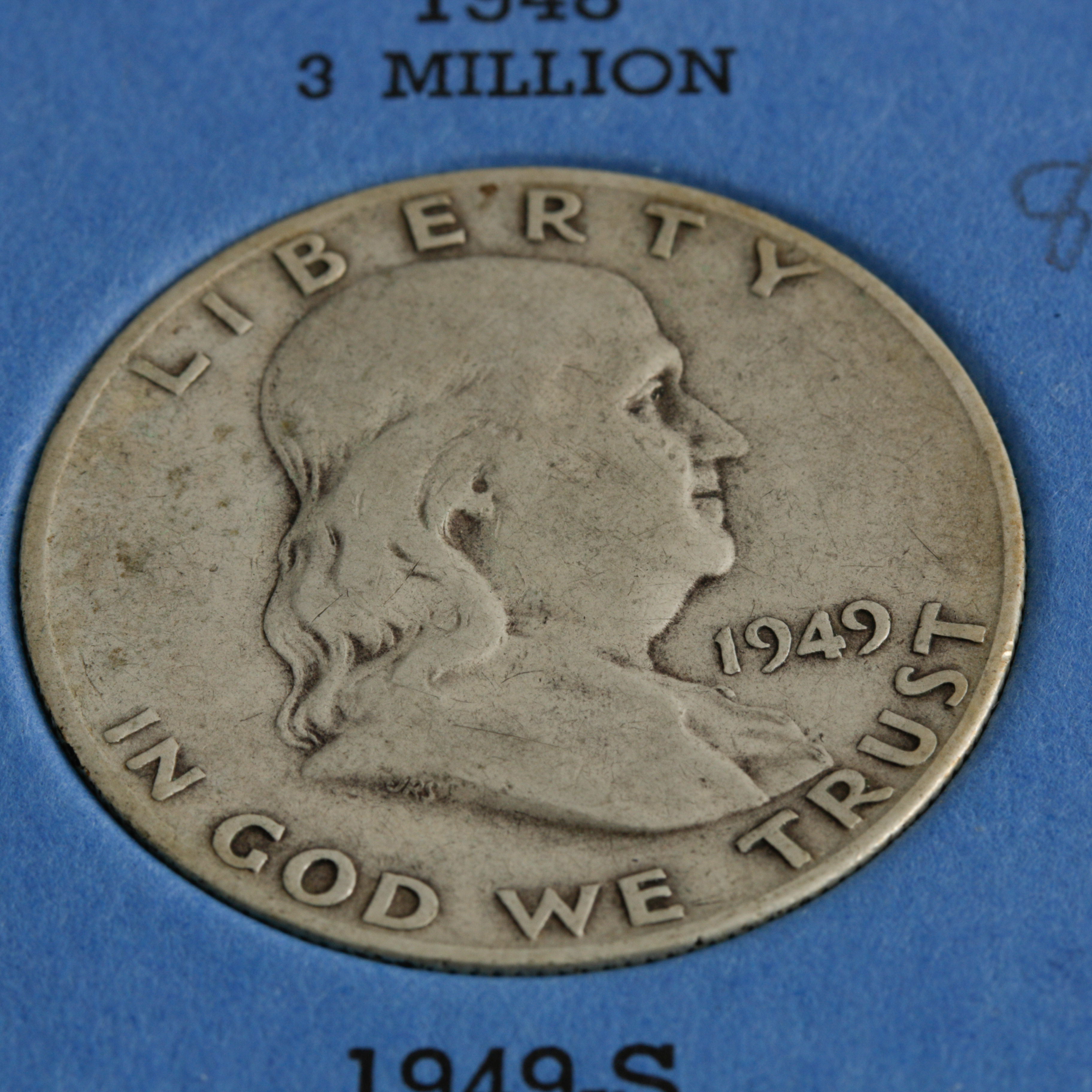 Group of 28 Benjamin Franklin Silver Half Dollars in a Whitman Coin Folder Ranging in Age from 1949 to 1963