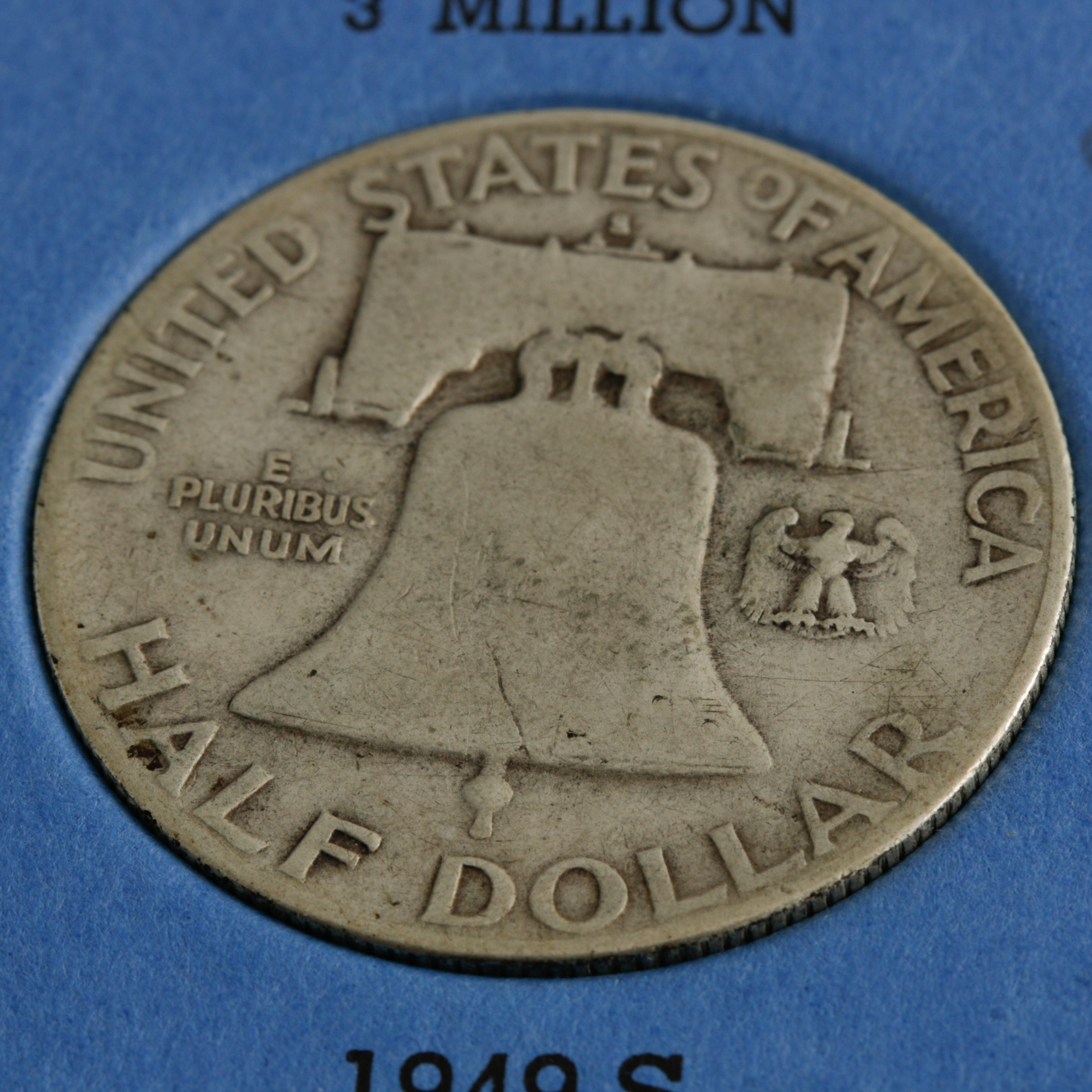 Group of 28 Benjamin Franklin Silver Half Dollars in a Whitman Coin Folder Ranging in Age from 1949 to 1963