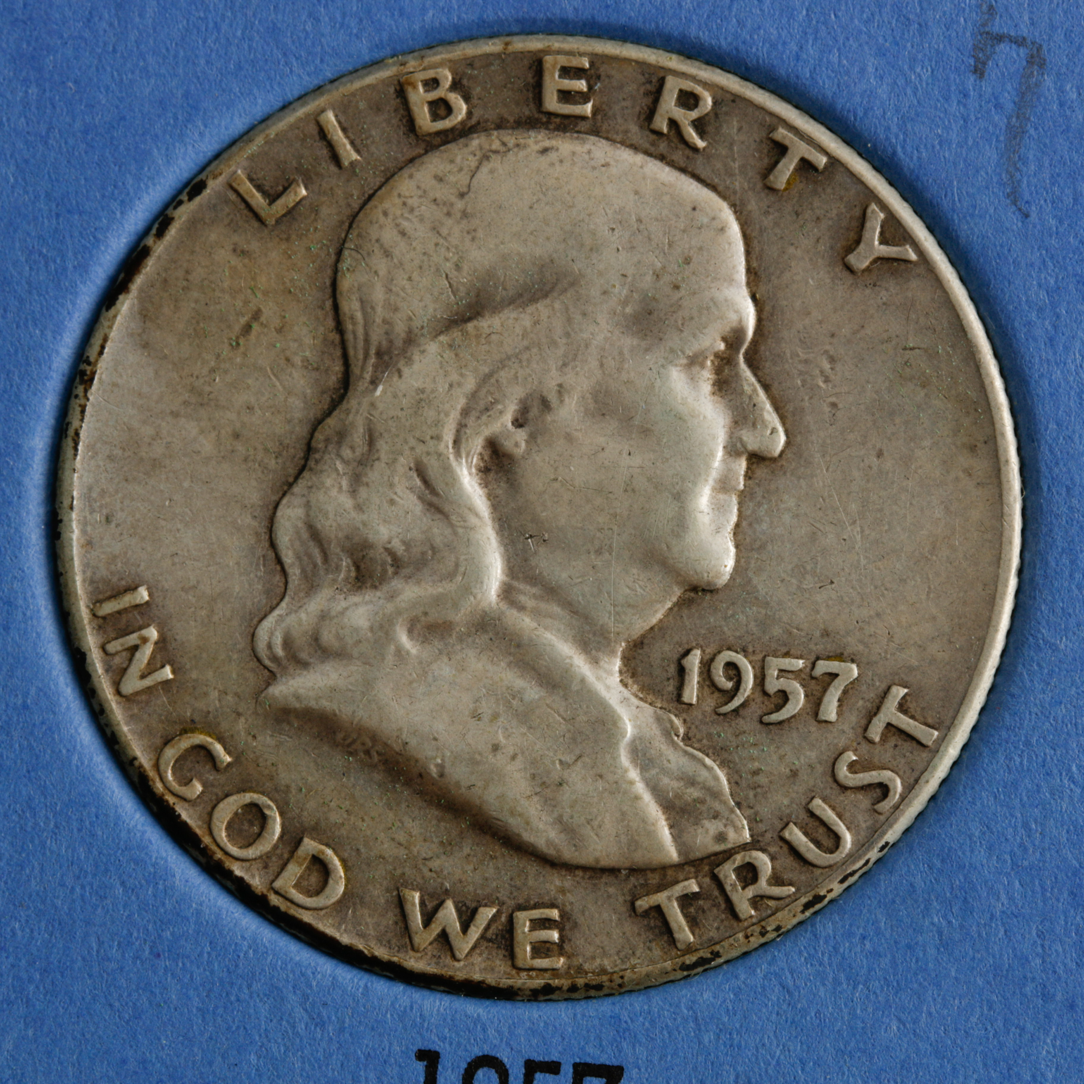 Group of 28 Benjamin Franklin Silver Half Dollars in a Whitman Coin Folder Ranging in Age from 1949 to 1963