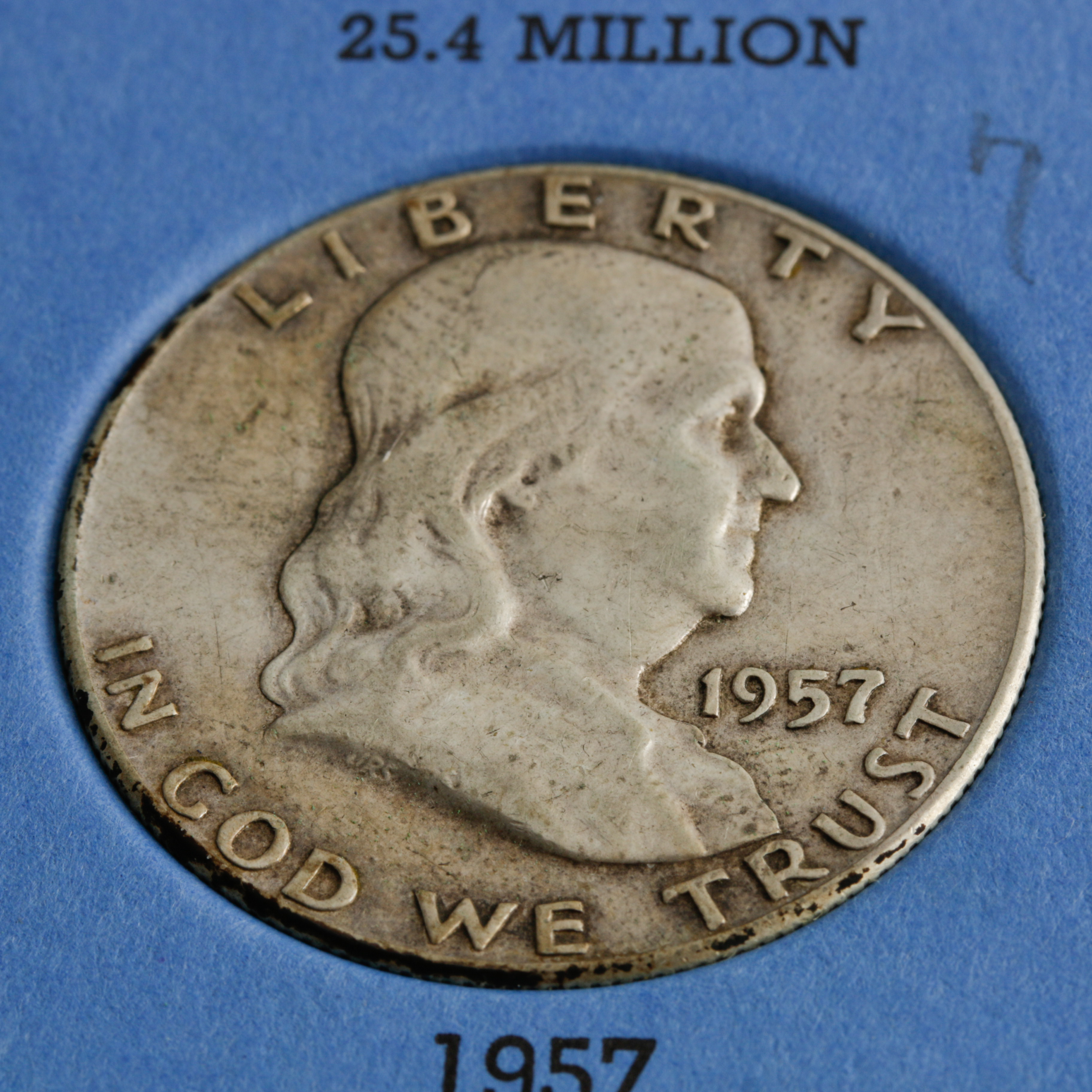 Group of 28 Benjamin Franklin Silver Half Dollars in a Whitman Coin Folder Ranging in Age from 1949 to 1963