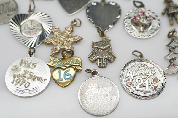Nineteen Sterling Silver Charms