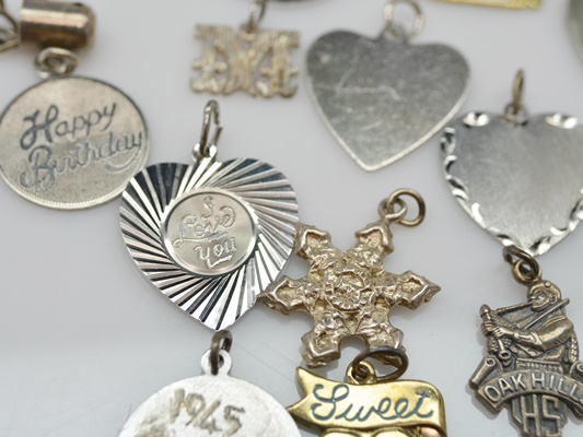 Nineteen Sterling Silver Charms