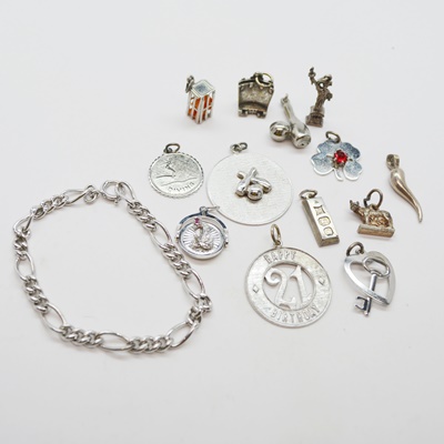 Thirteen Sterling Silver Charms and Charm Bracelet