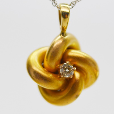 Victorian 14K Yellow Gold Diamond Love Knot Pendant on a Modern 14K White Gold Chain