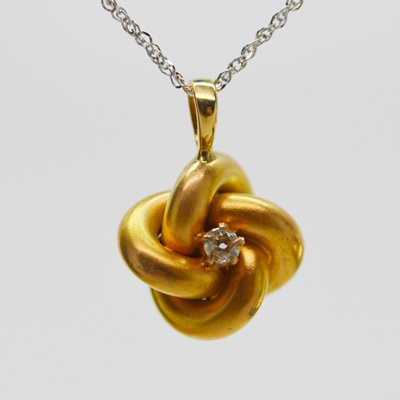 Victorian 14K Yellow Gold Diamond Love Knot Pendant on a Modern 14K White Gold Chain