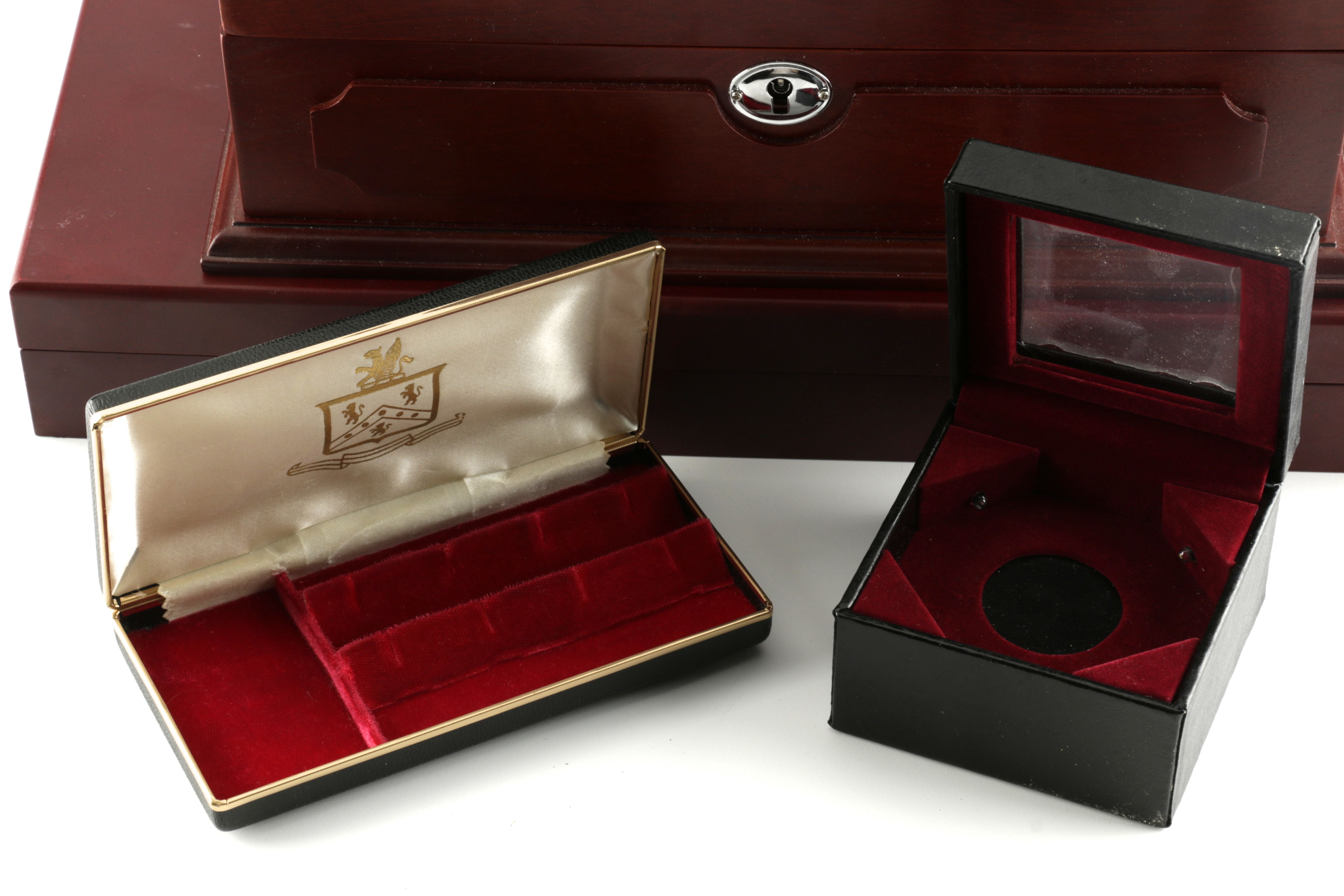 Two Wooden Coin Display Cases and Five Small Coin Boxes