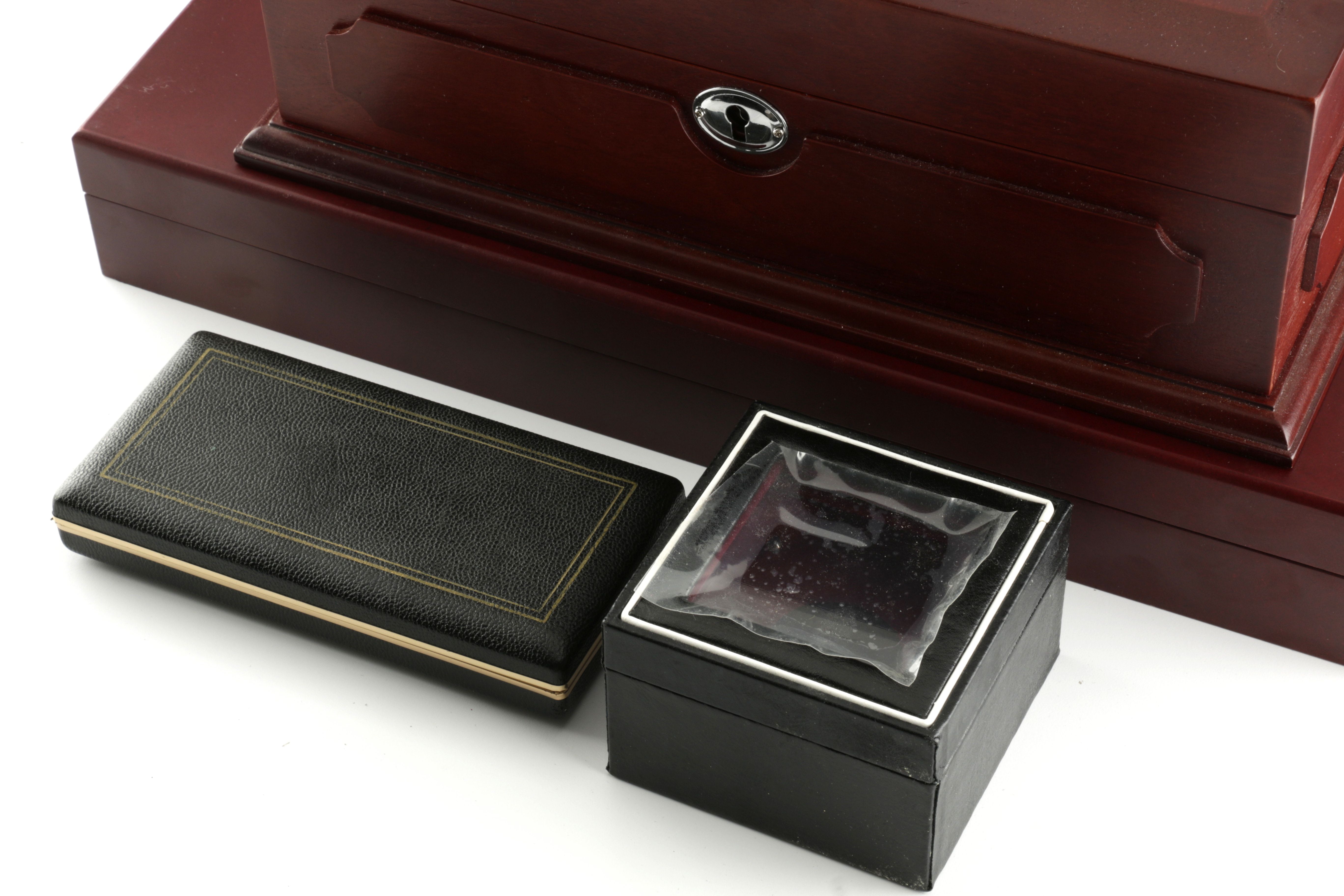 Two Wooden Coin Display Cases and Five Small Coin Boxes