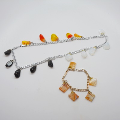 Four Metal Bracelets With Stone Dangles