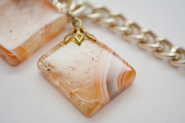 Four Metal Bracelets With Stone Dangles