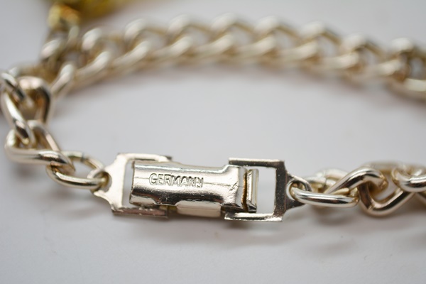 Four Metal Bracelets With Stone Dangles