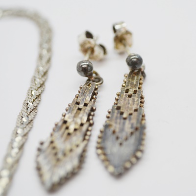 Three Pair of Sterling Silver Earrings and Four Sterling Silver Necklaces