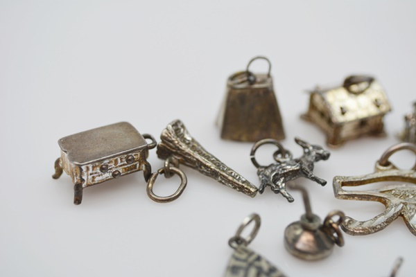 Thirteen Sterling Silver Charms