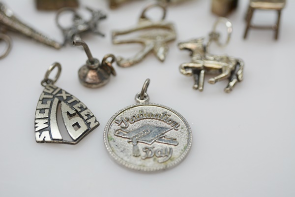 Thirteen Sterling Silver Charms