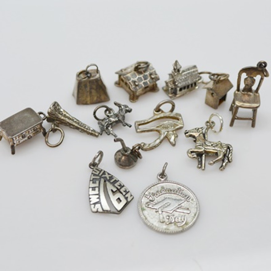 Thirteen Sterling Silver Charms