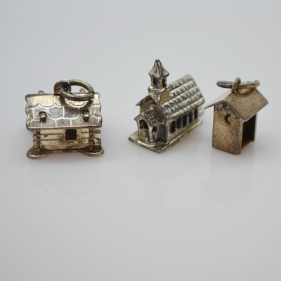 Thirteen Sterling Silver Charms