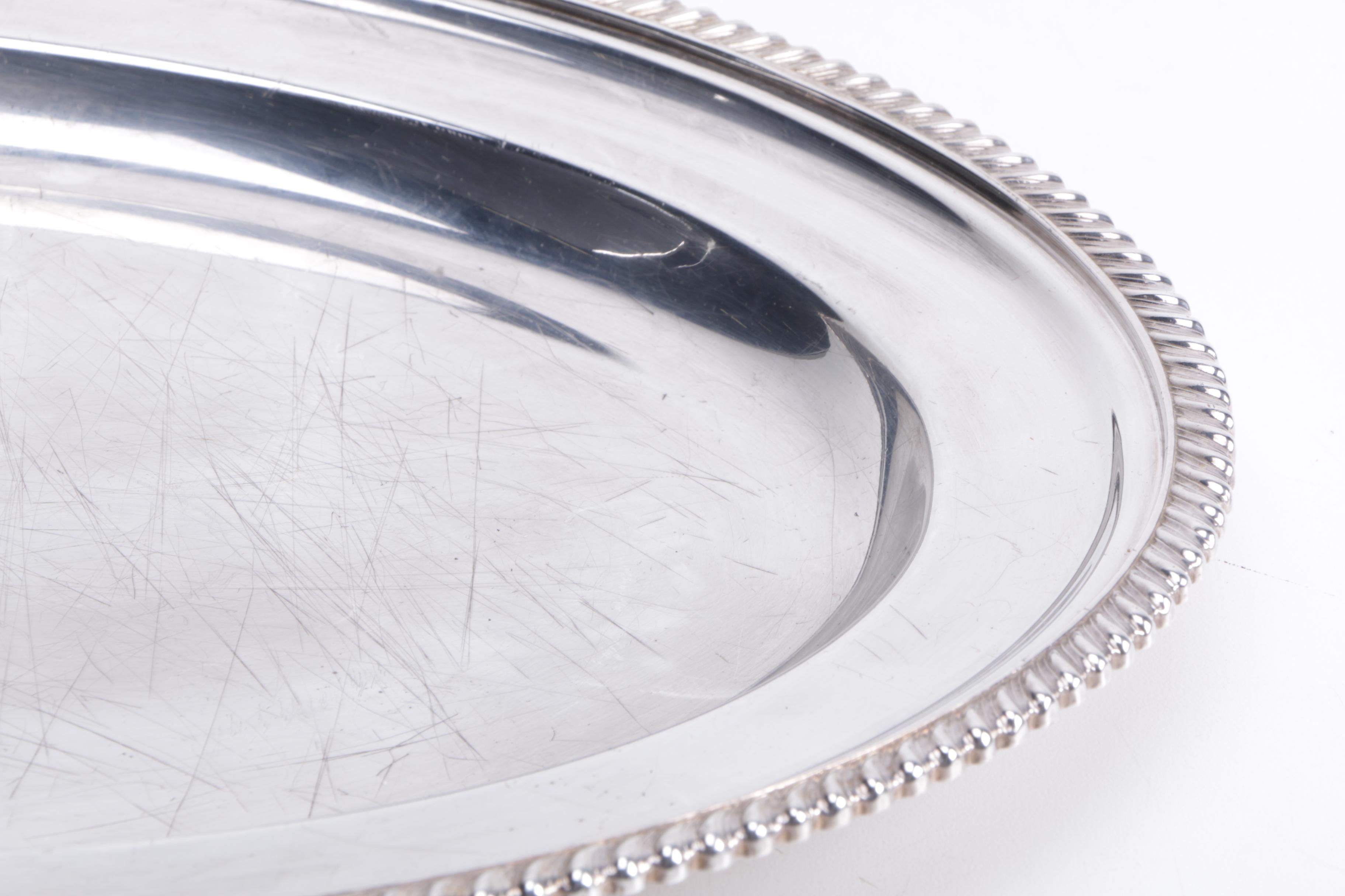 Silver Plate Trays and Trivets Featuring Reed & Barton