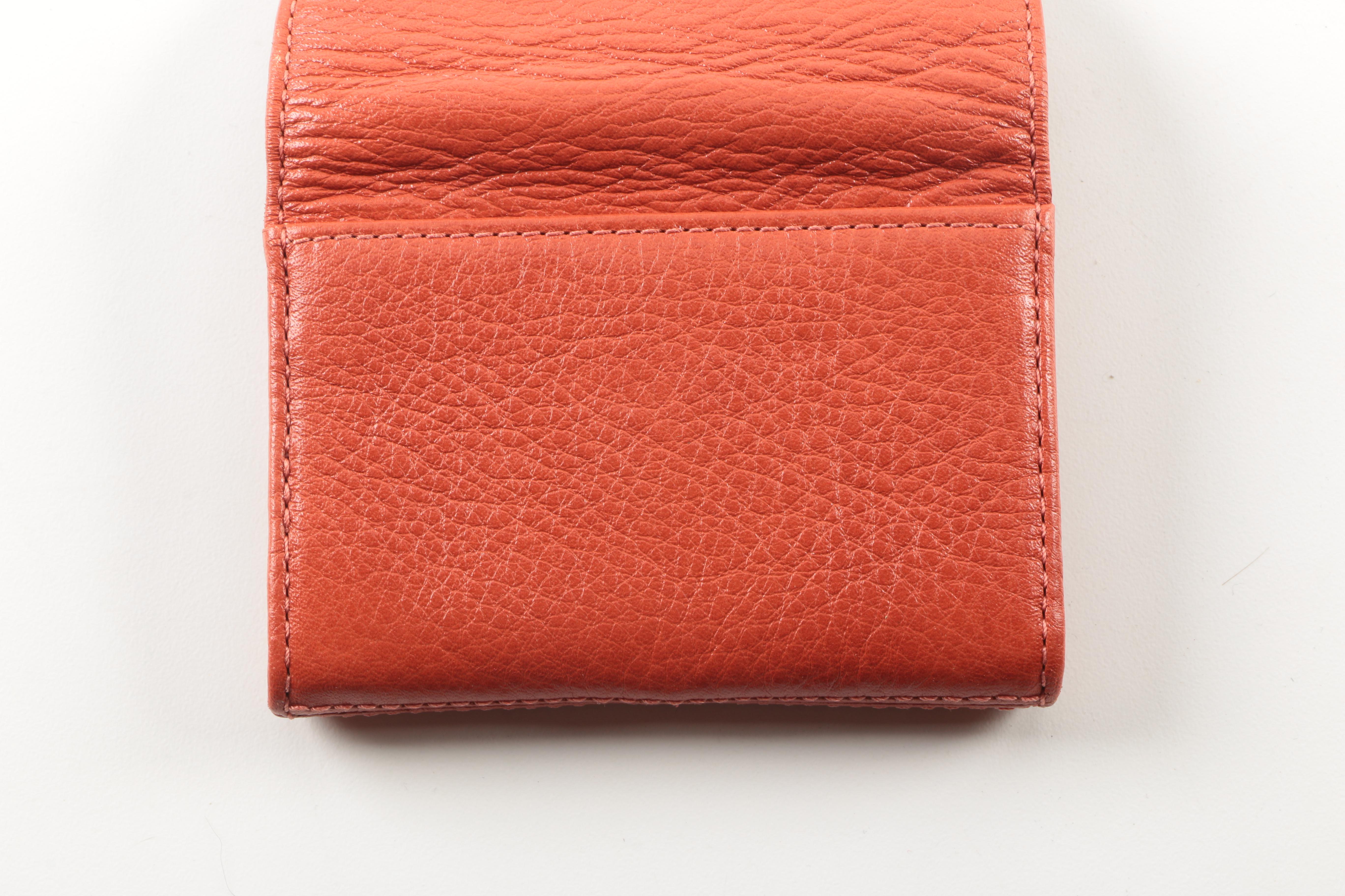 Coach Pewter Convertible Clutch and Coral Wallets