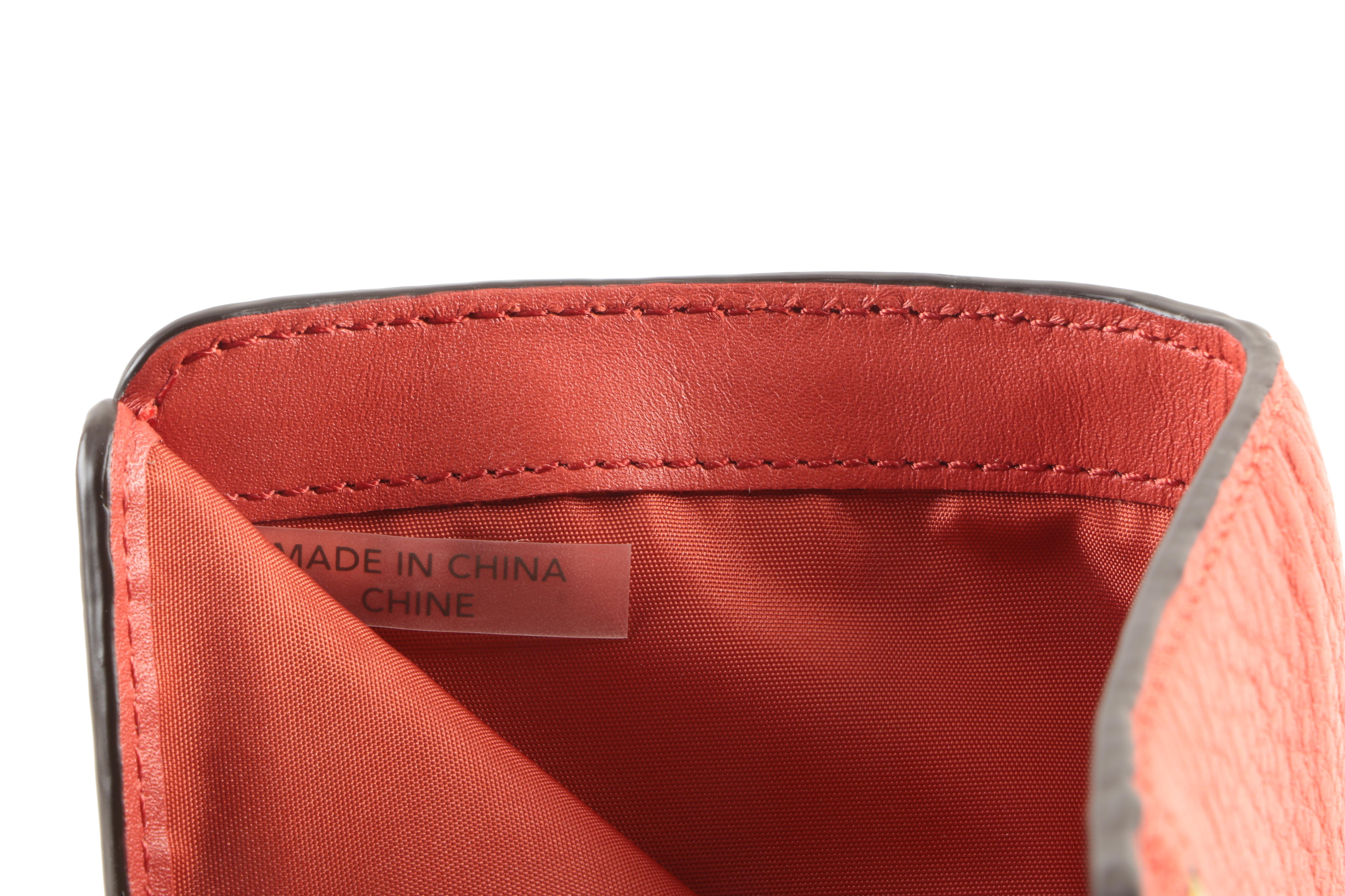 Coach Pewter Convertible Clutch and Coral Wallets