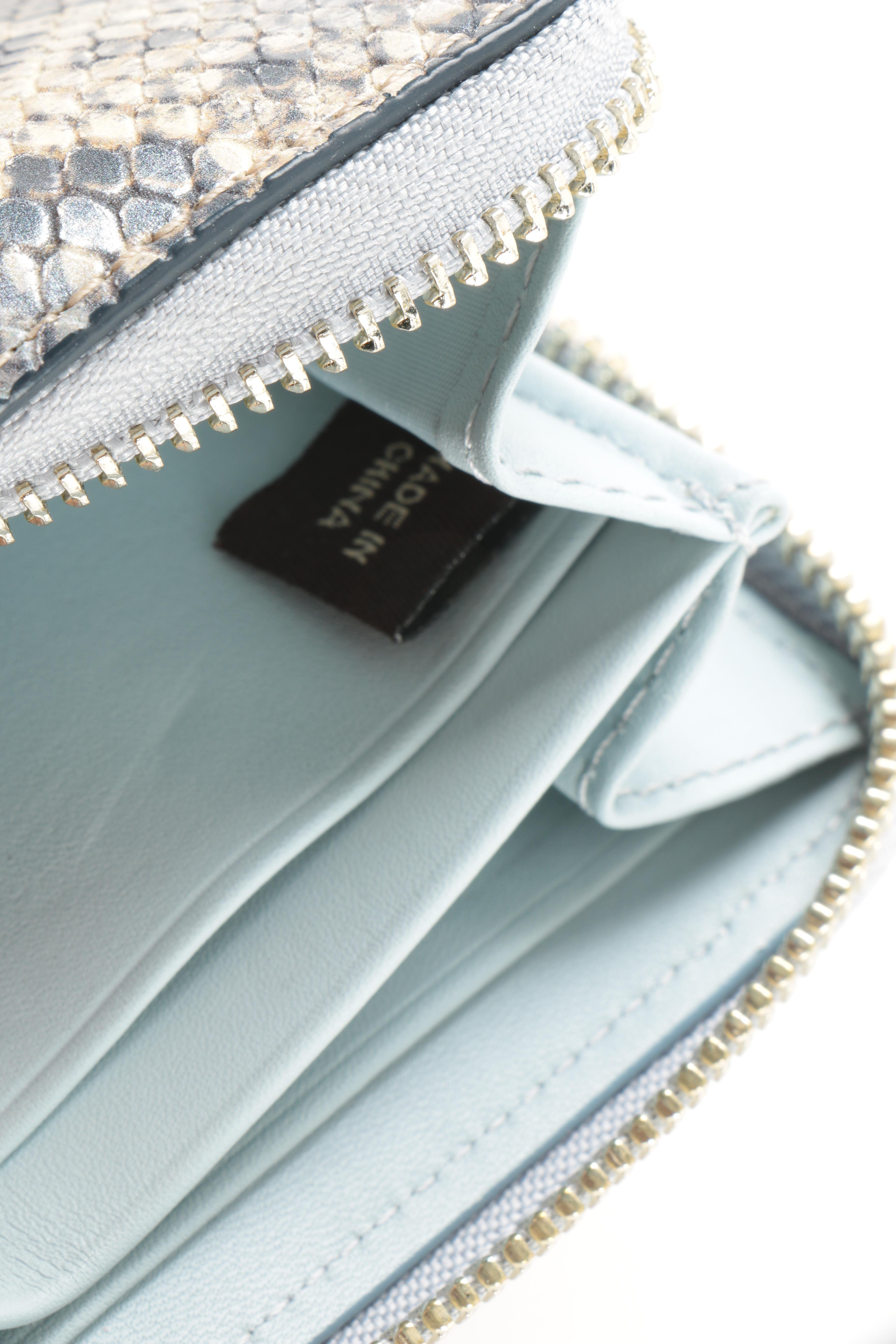 Coach Embossed Python Wallets