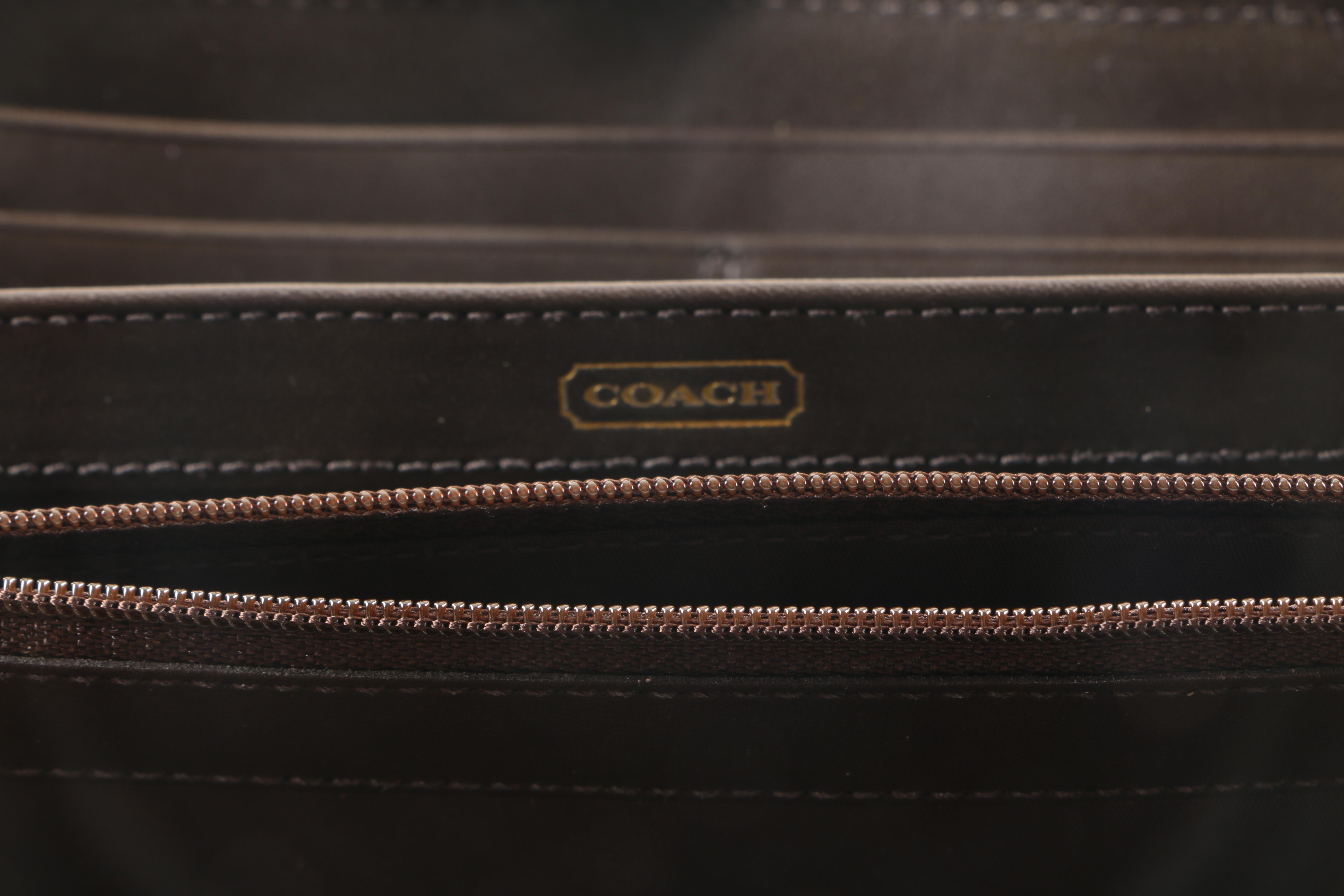 Coach Embossed Python Wristlet and Wallet