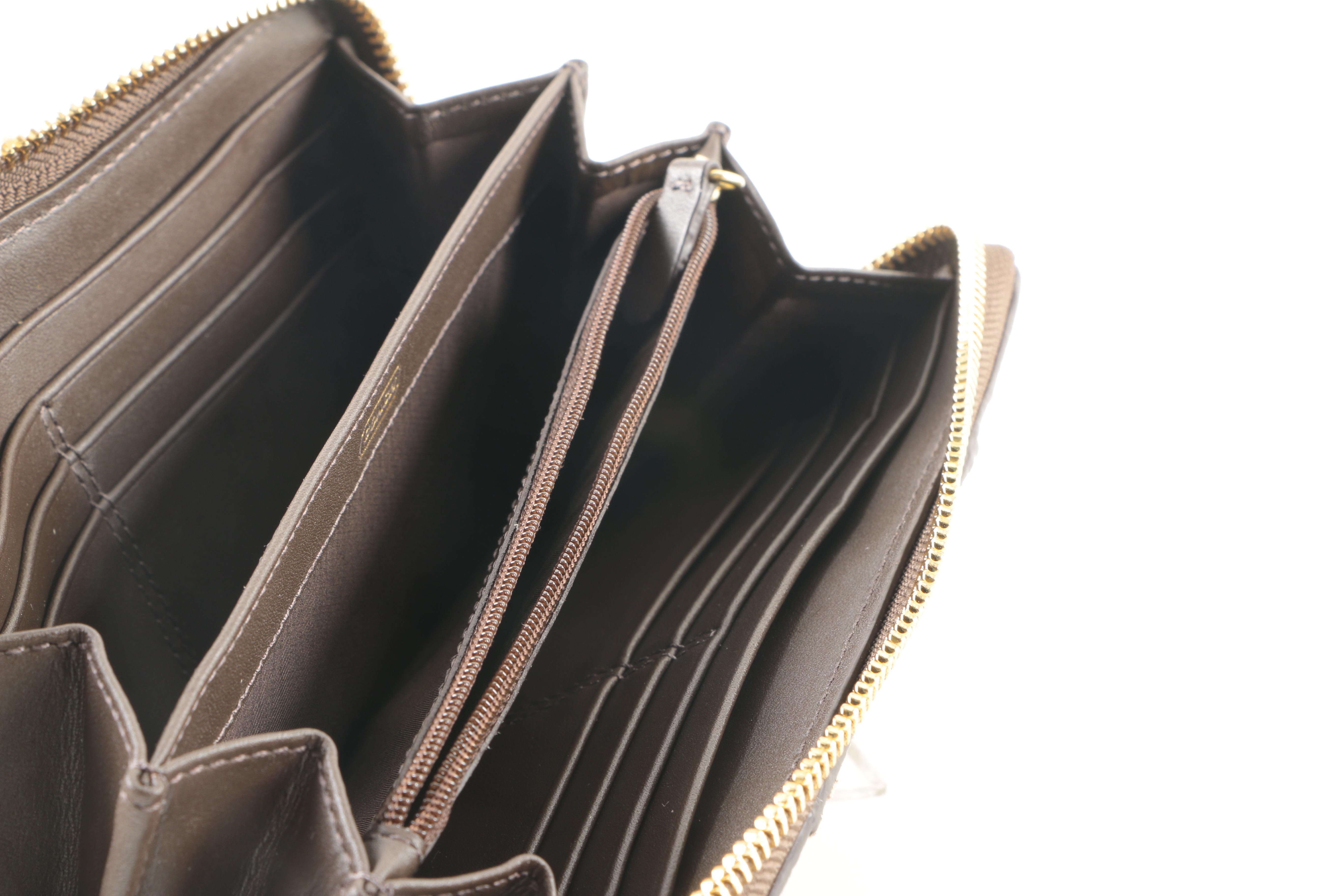 Coach Embossed Python Wristlet and Wallet