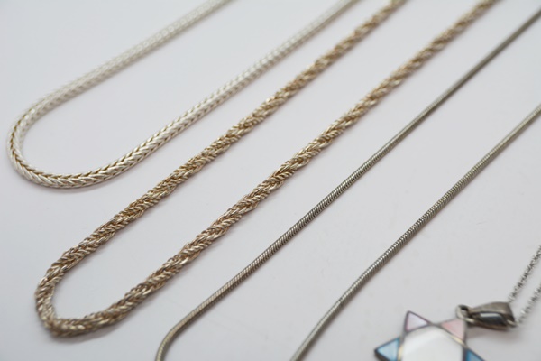 Two Sterling Silver Pendant Necklaces and Three Sterling Silver Chain Necklaces