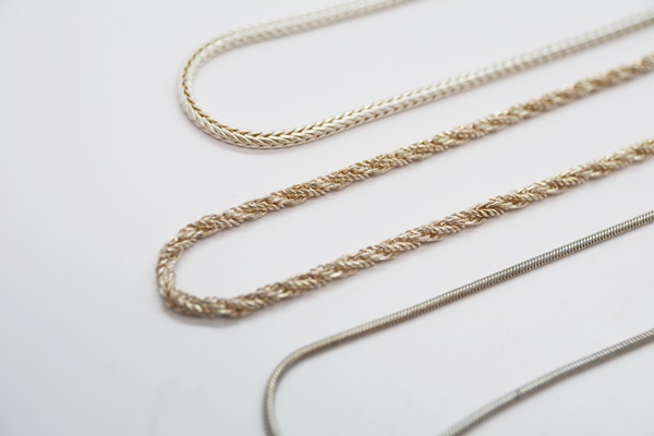 Two Sterling Silver Pendant Necklaces and Three Sterling Silver Chain Necklaces