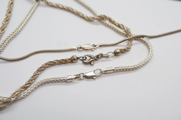 Two Sterling Silver Pendant Necklaces and Three Sterling Silver Chain Necklaces