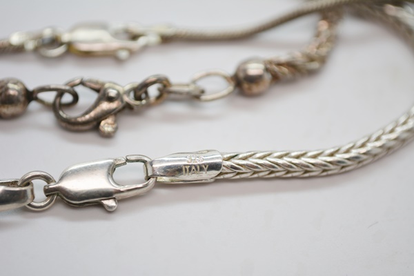 Two Sterling Silver Pendant Necklaces and Three Sterling Silver Chain Necklaces