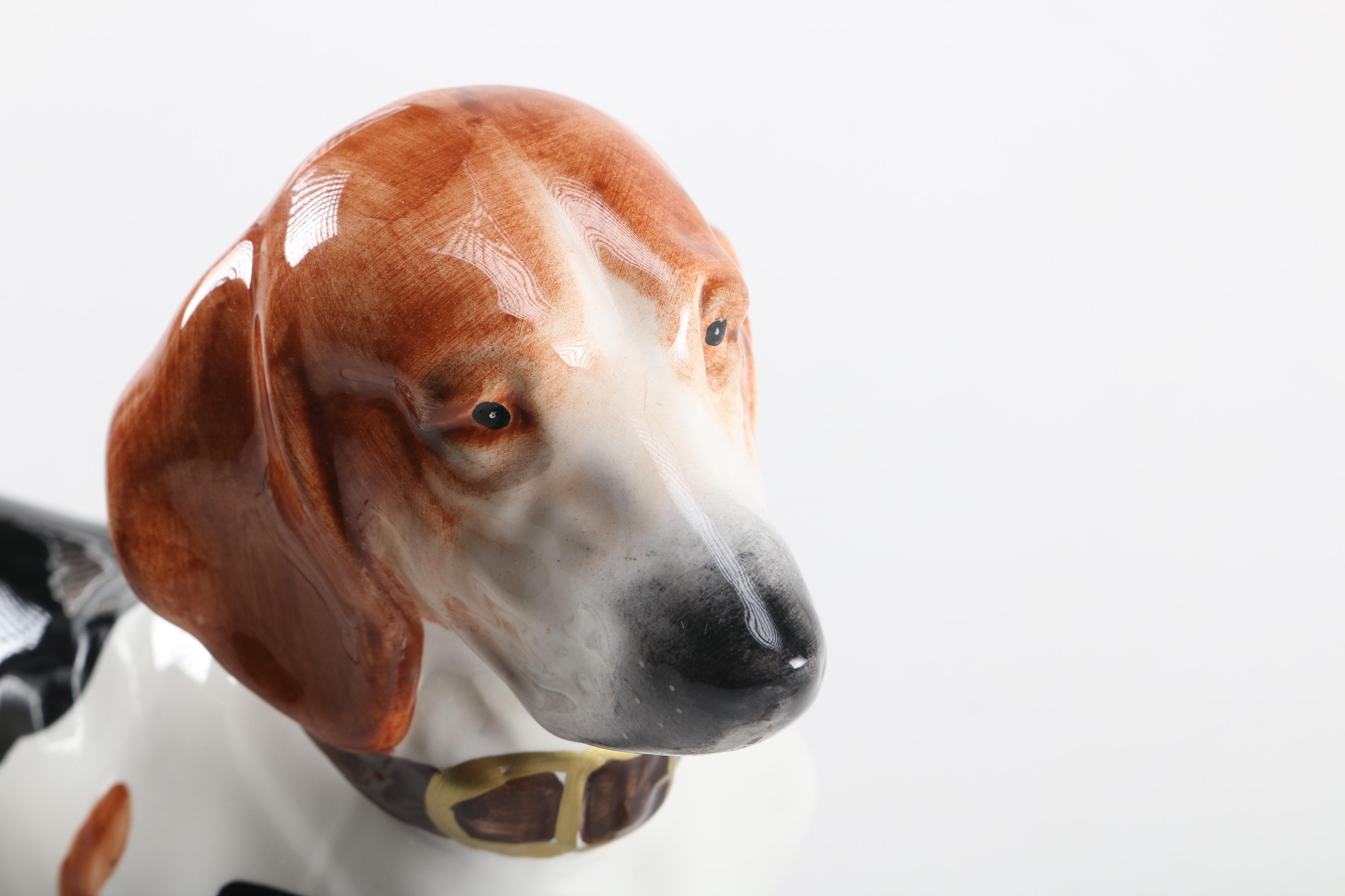 Figurines of a Lion and Two Dogs Featuring Chelsea House