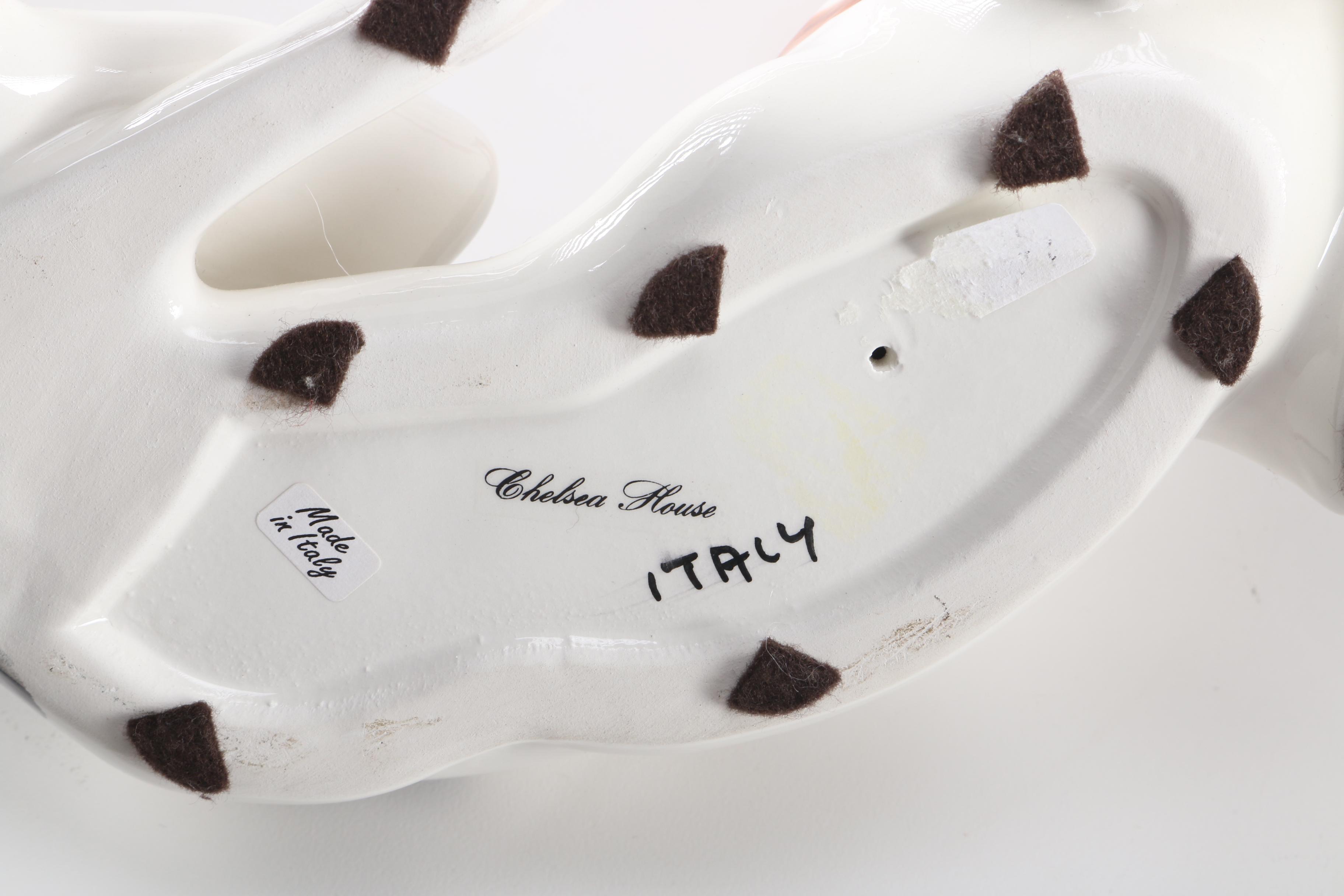 Figurines of a Lion and Two Dogs Featuring Chelsea House