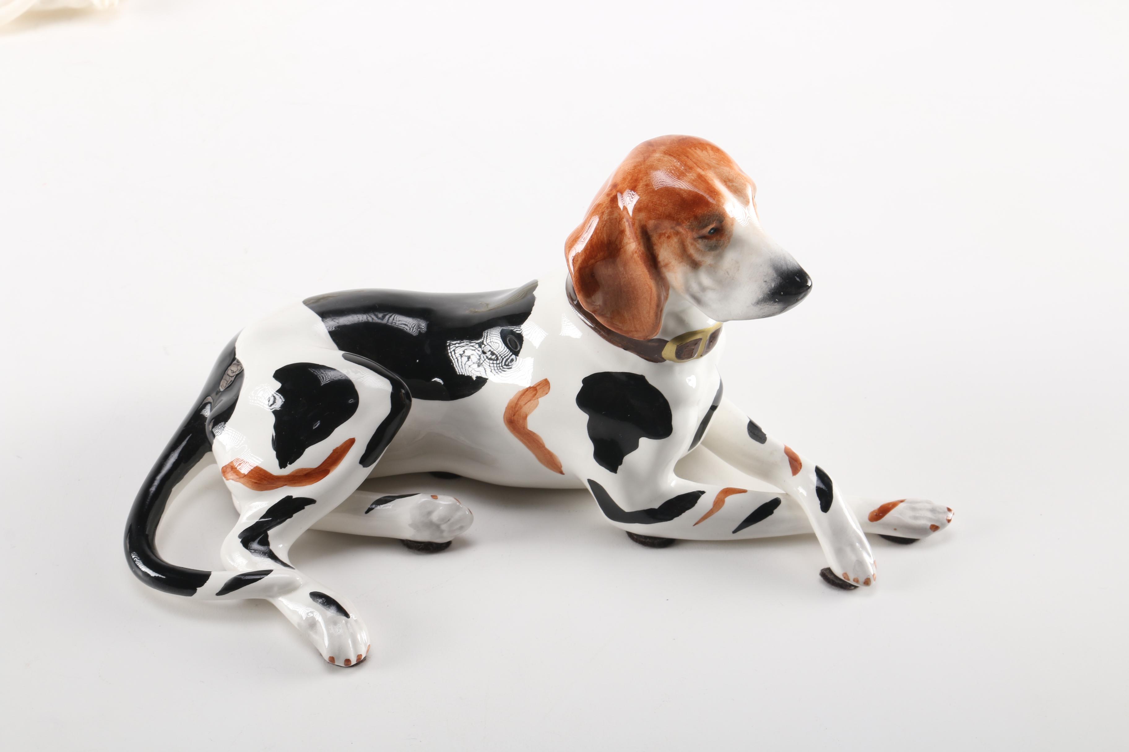 Figurines of a Lion and Two Dogs Featuring Chelsea House