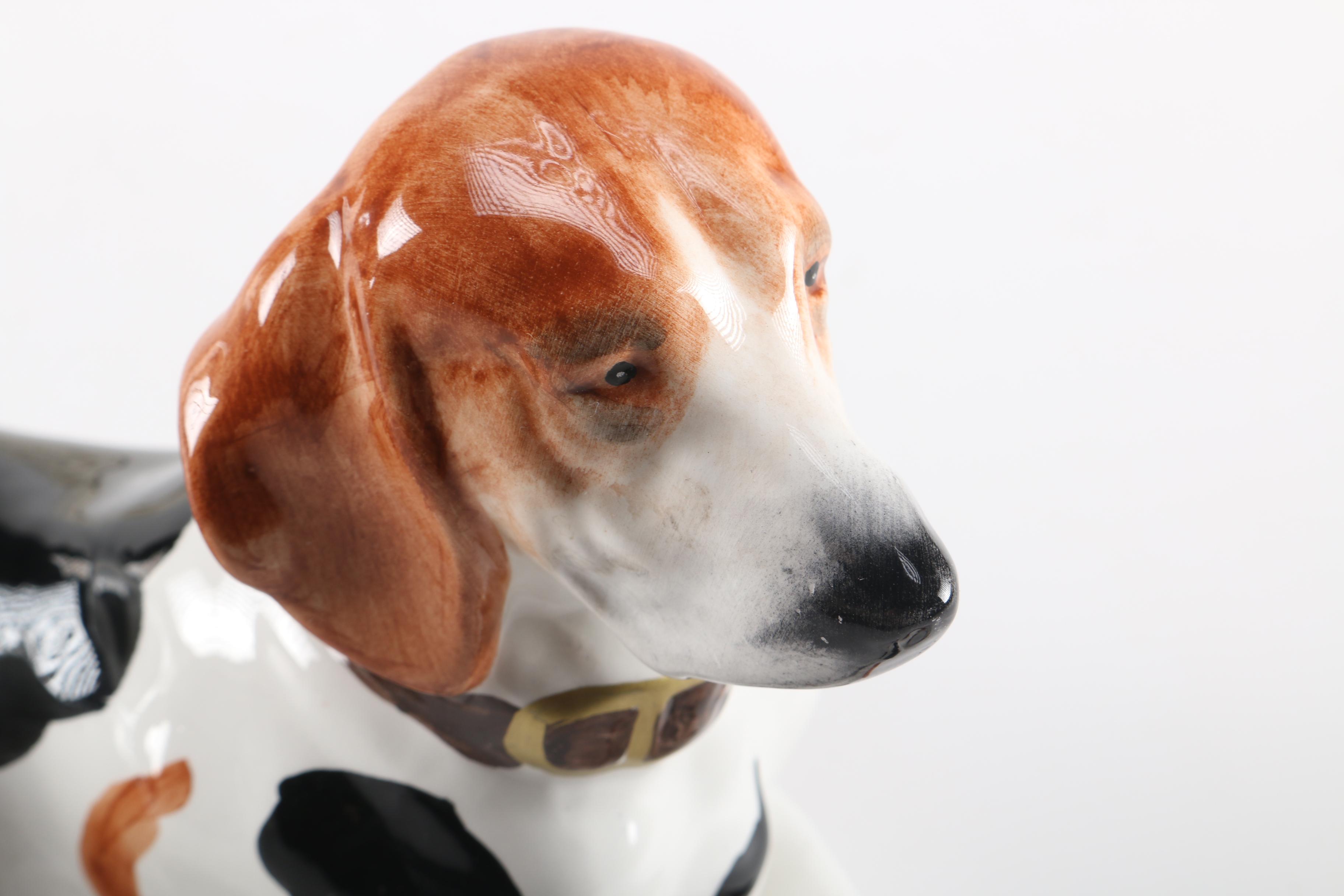 Figurines of a Lion and Two Dogs Featuring Chelsea House