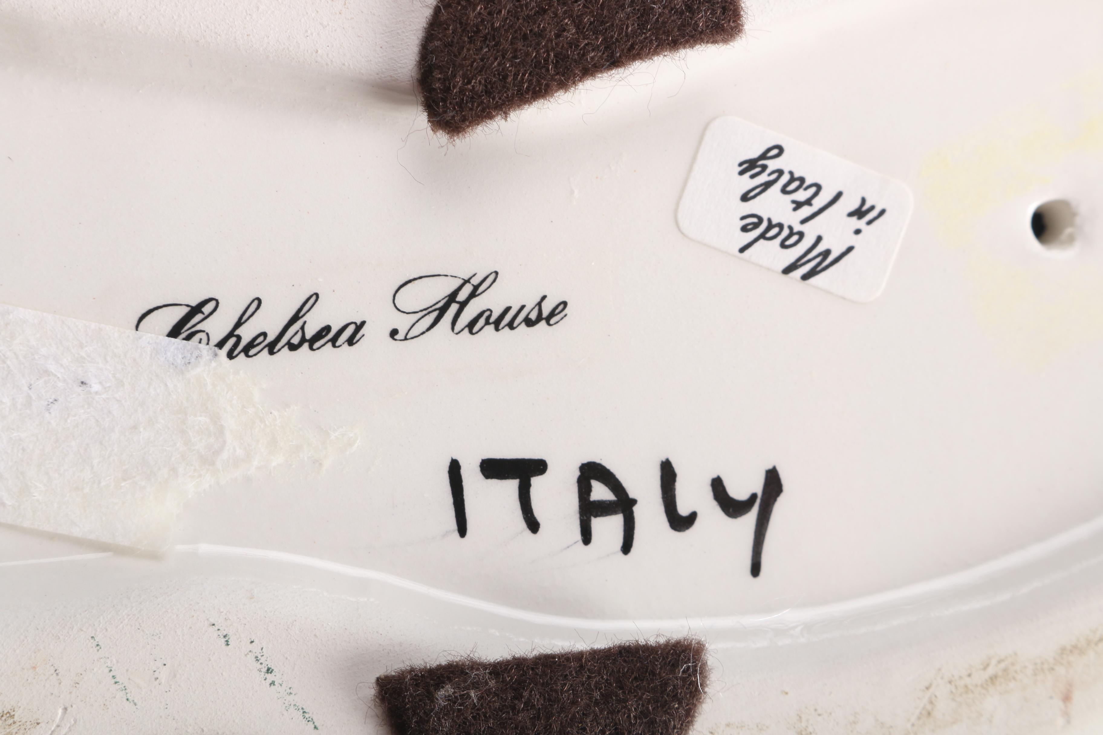 Figurines of a Lion and Two Dogs Featuring Chelsea House