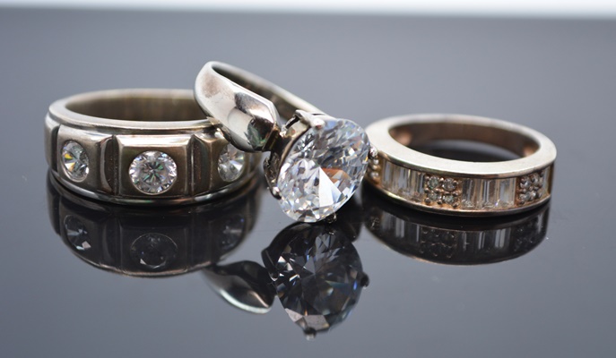 Four Sterling Silver Cubic Zirconia Rings