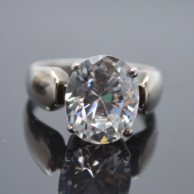 Four Sterling Silver Cubic Zirconia Rings