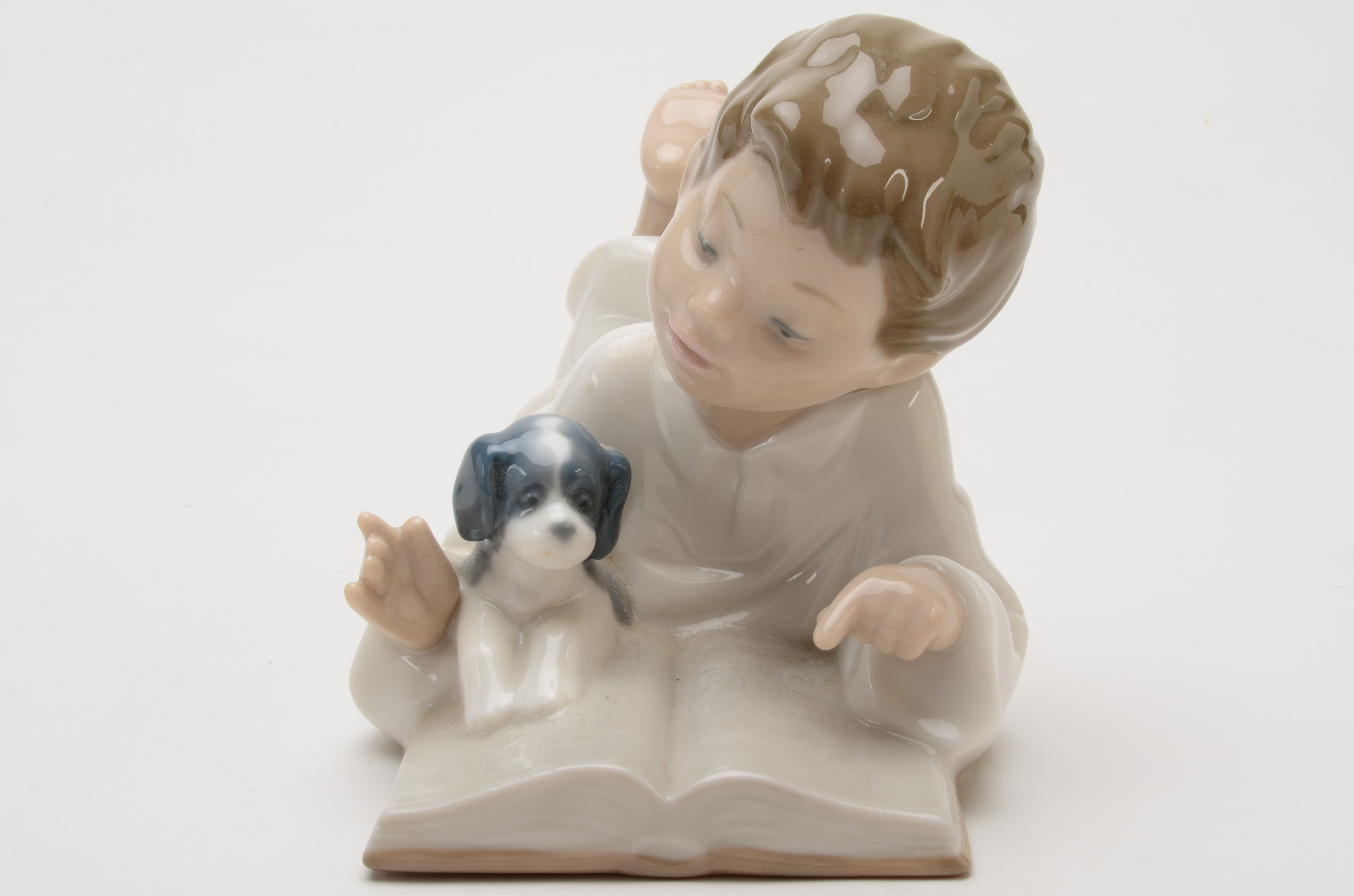 Lladro "Repeat after Me" Boy with Puppy Reading Figurine