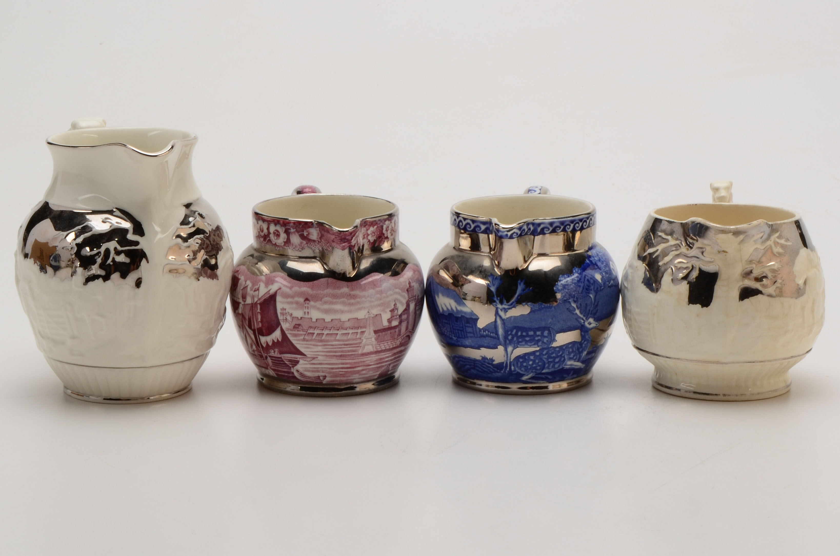 Four Vintage Wedgwood of Etruria & Barlaston Luster Trim Jugs