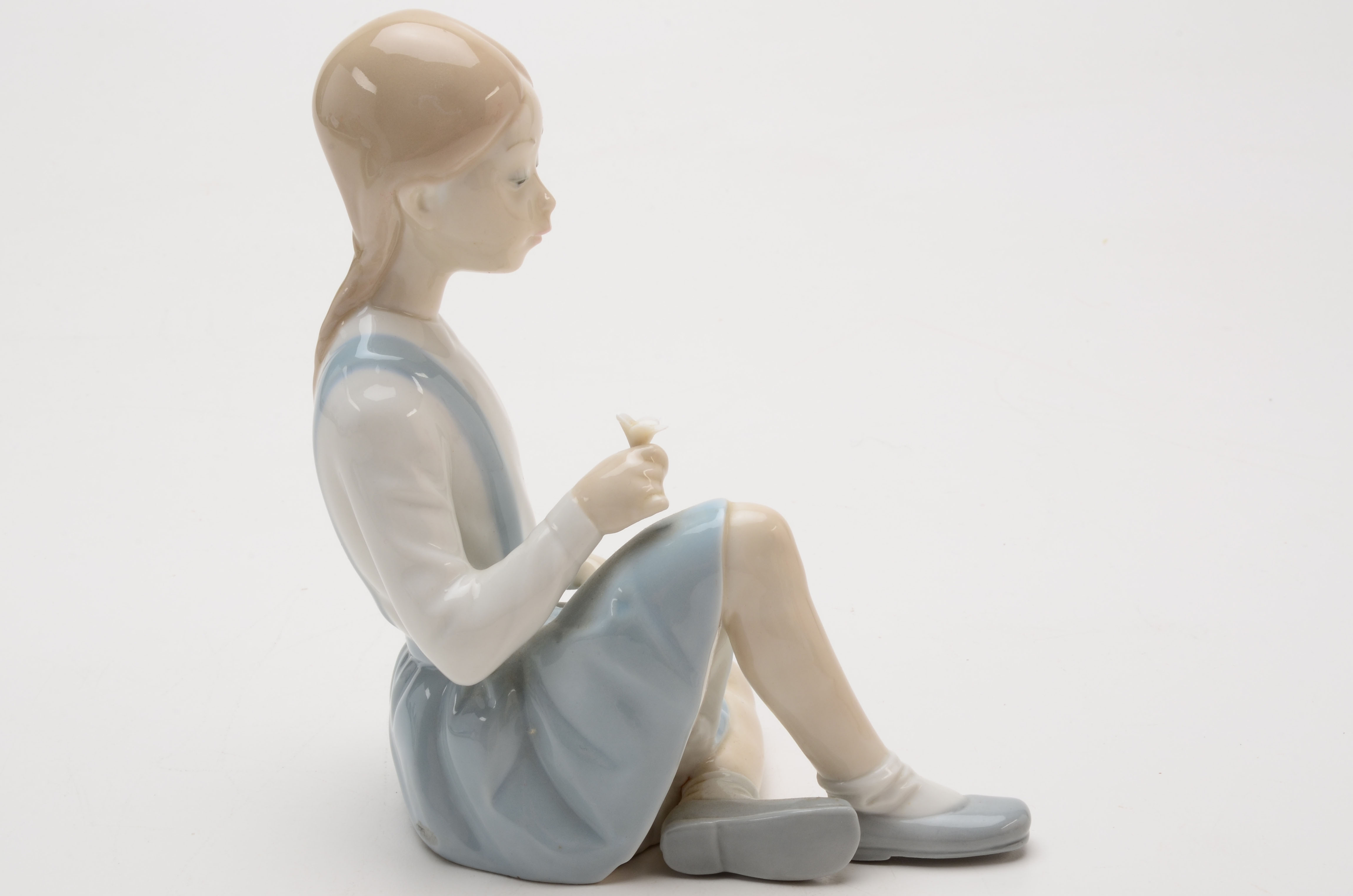 Lladro Girl with Flower Figurine