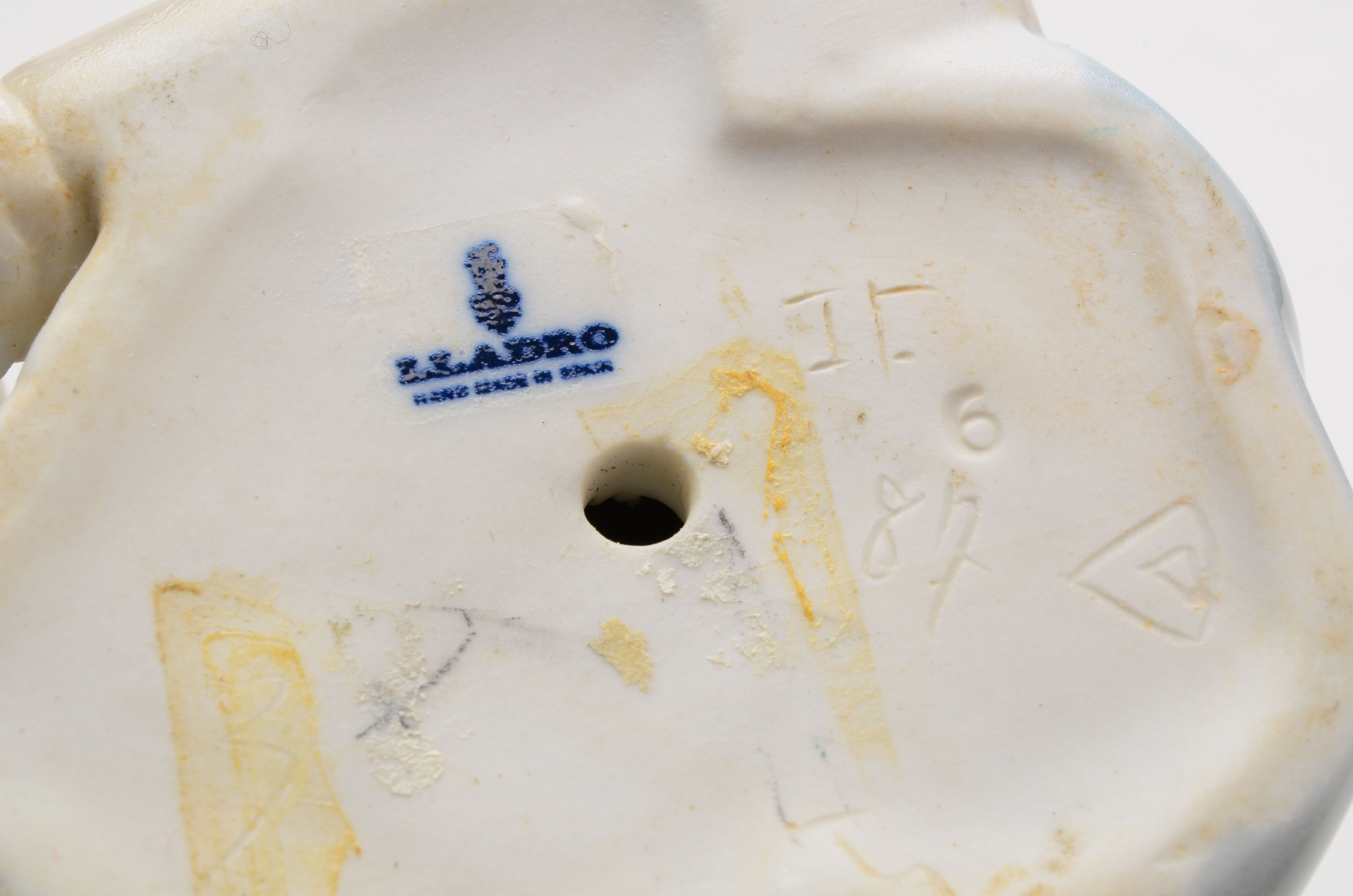 Lladro Girl with Flower Figurine