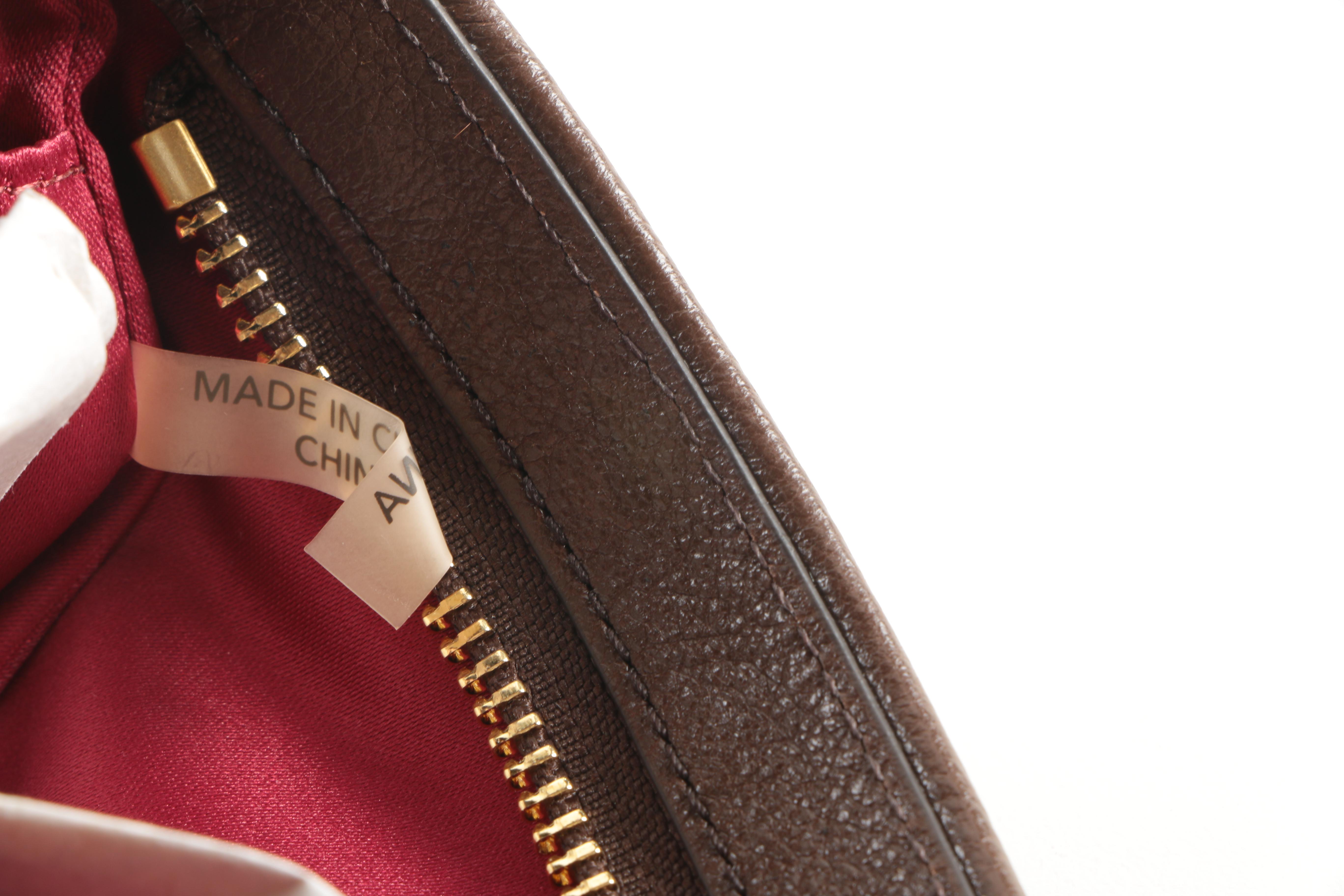 Coach "Madison" Flat Clutch in Mixed Haircalf Leather