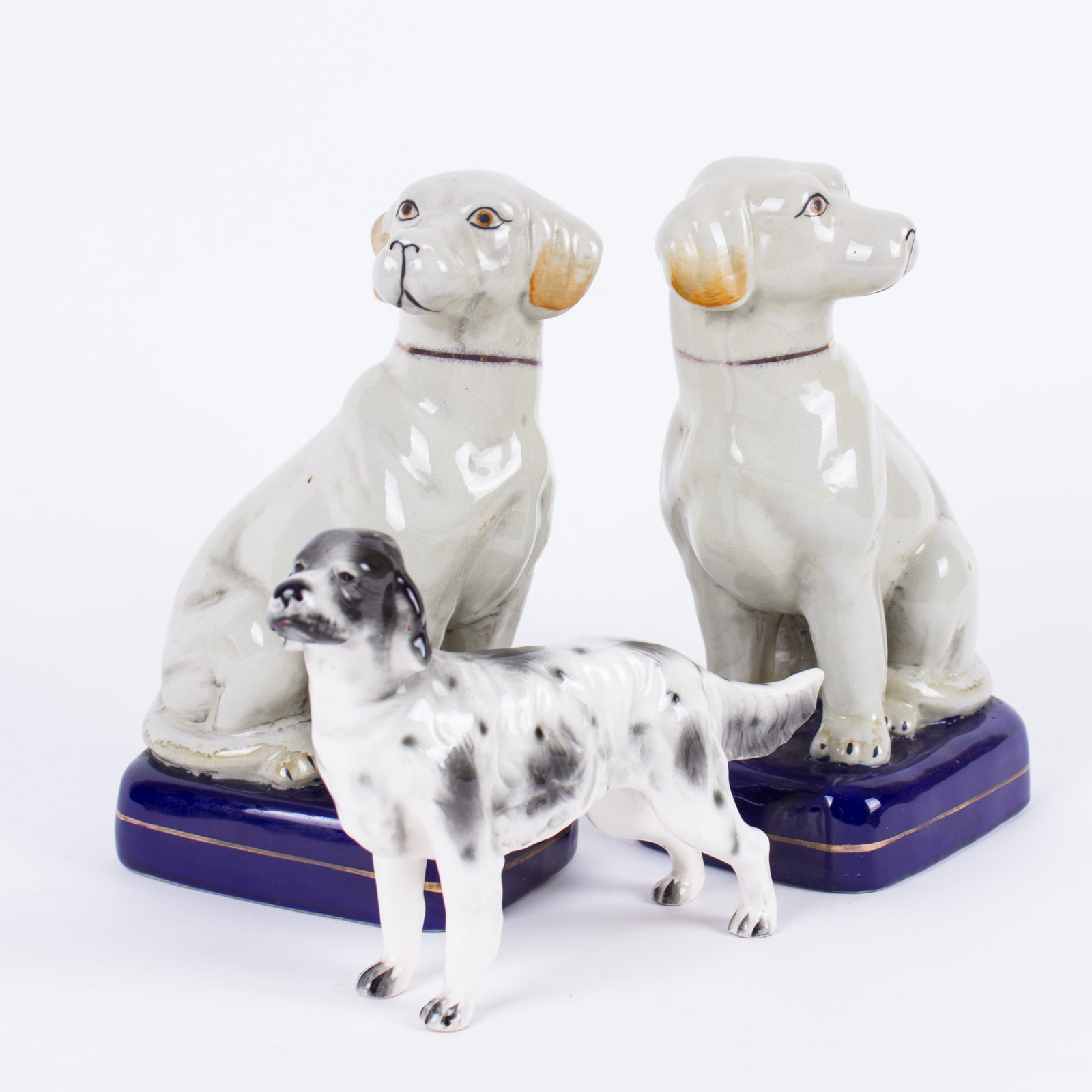Three Porcelain Dog  Figurines
