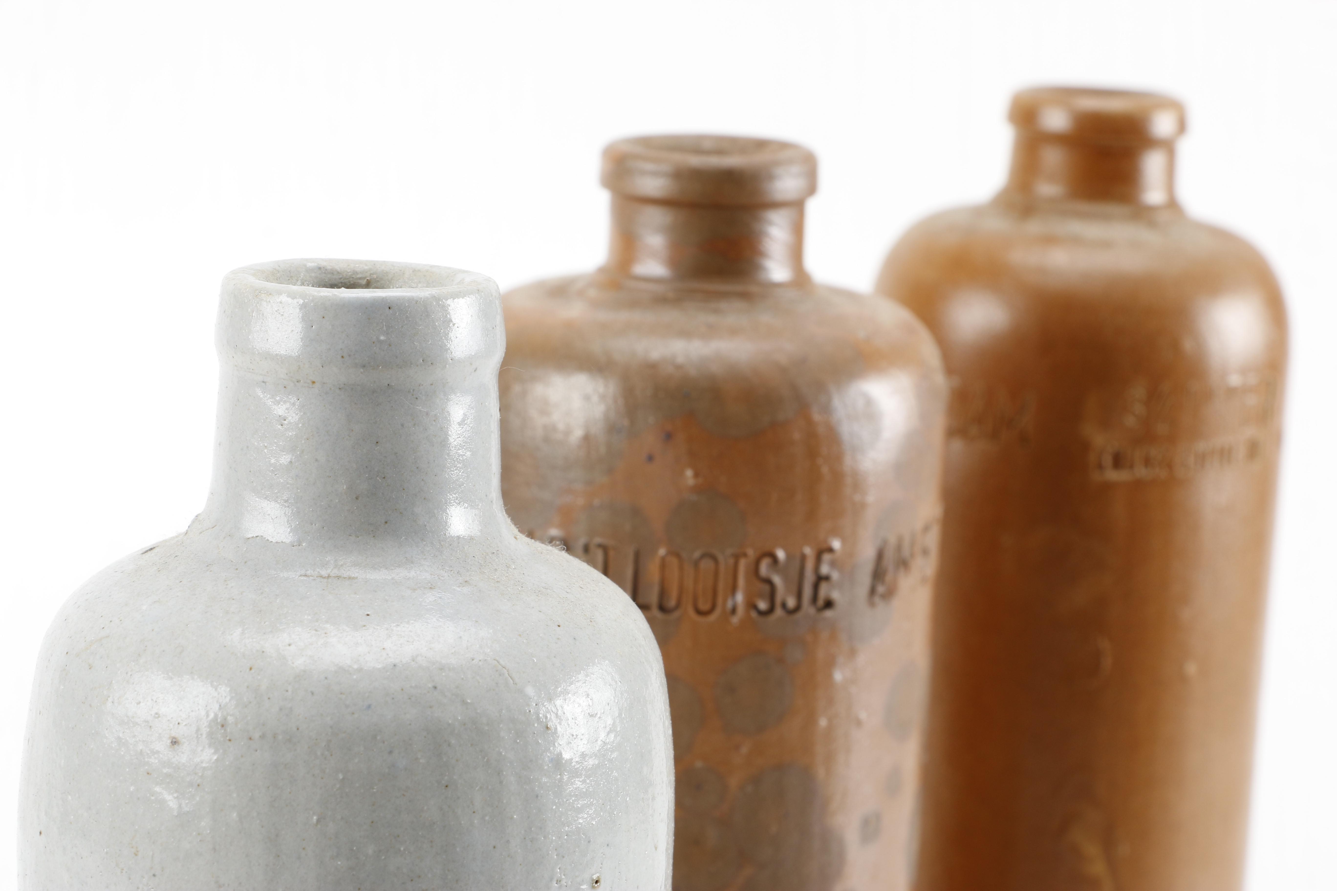 Collection of Vintage Stoneware Crocks Including Erven Lucas Bols