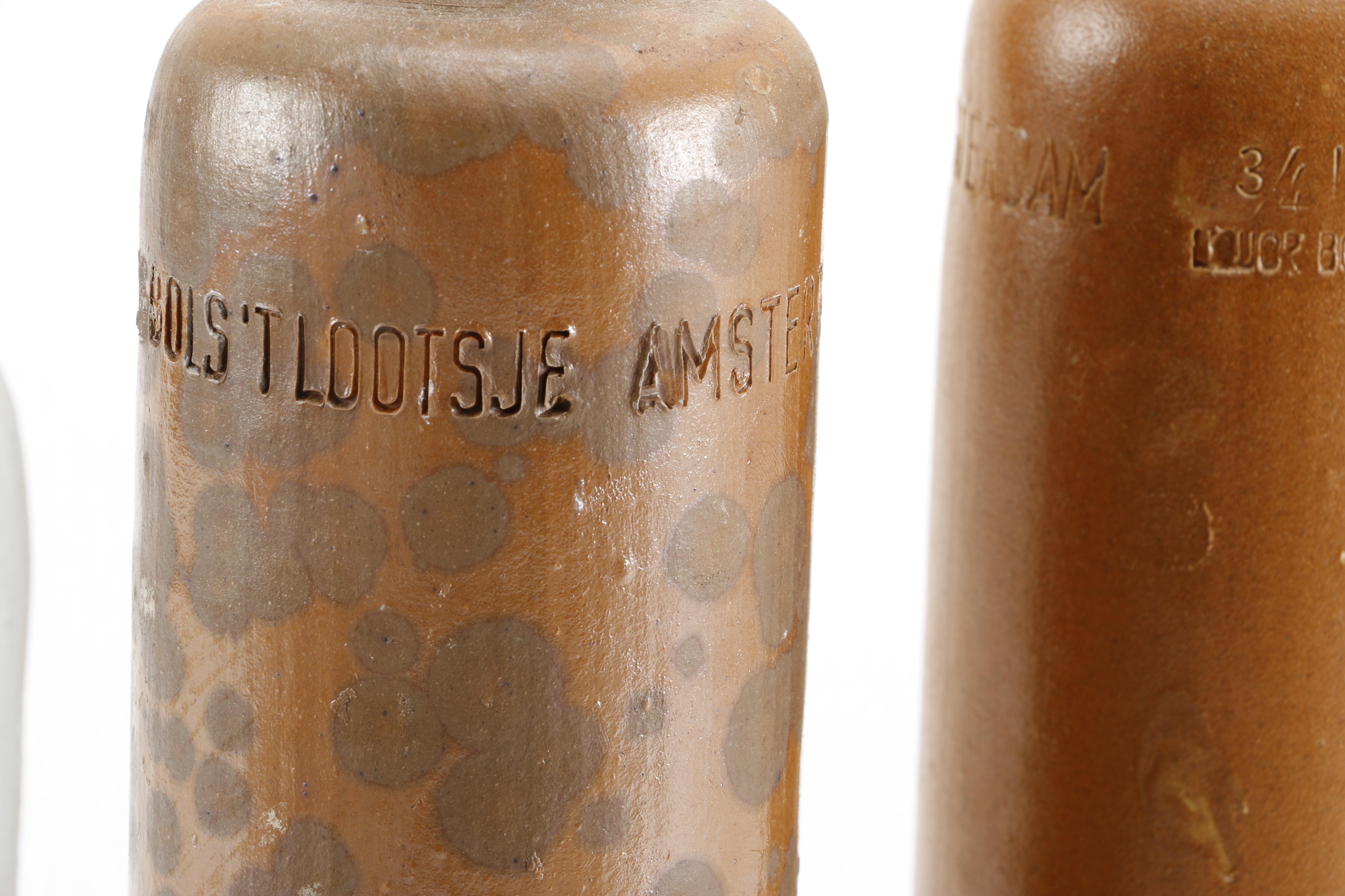 Collection of Vintage Stoneware Crocks Including Erven Lucas Bols